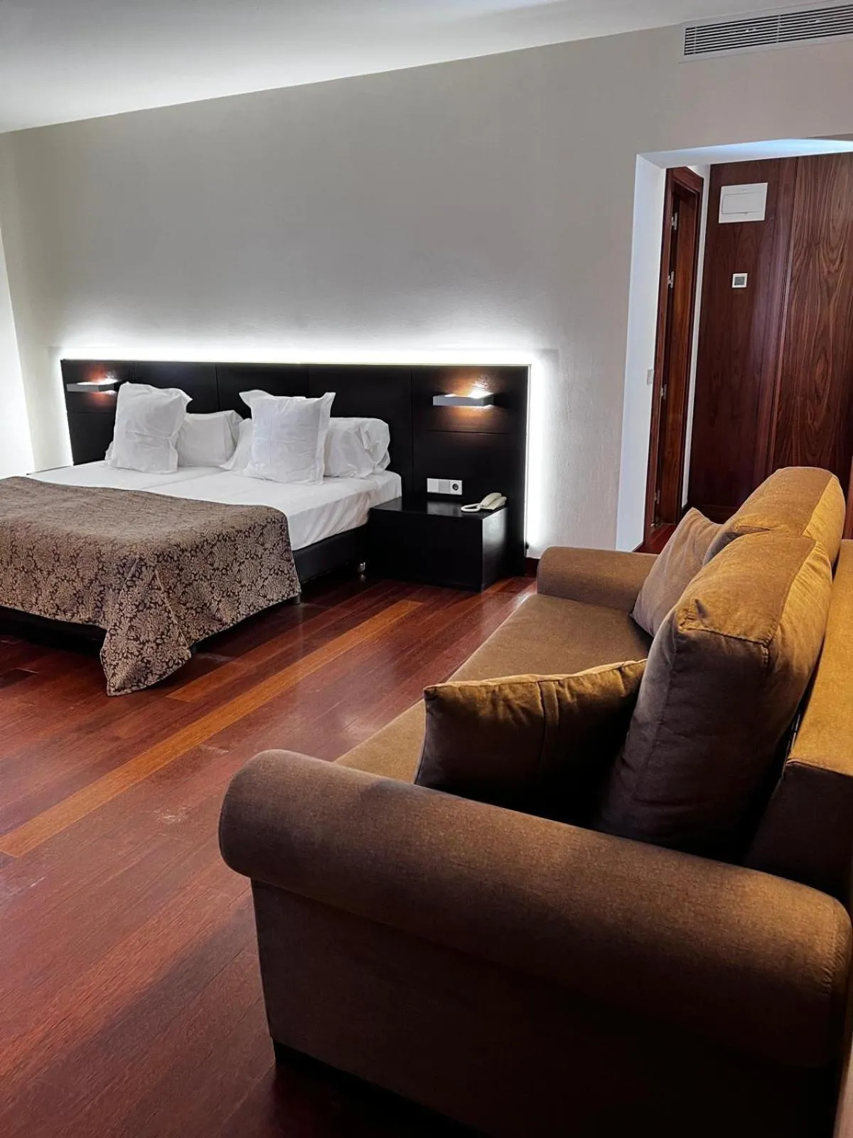 Bed in Hotel Palacio de Merás