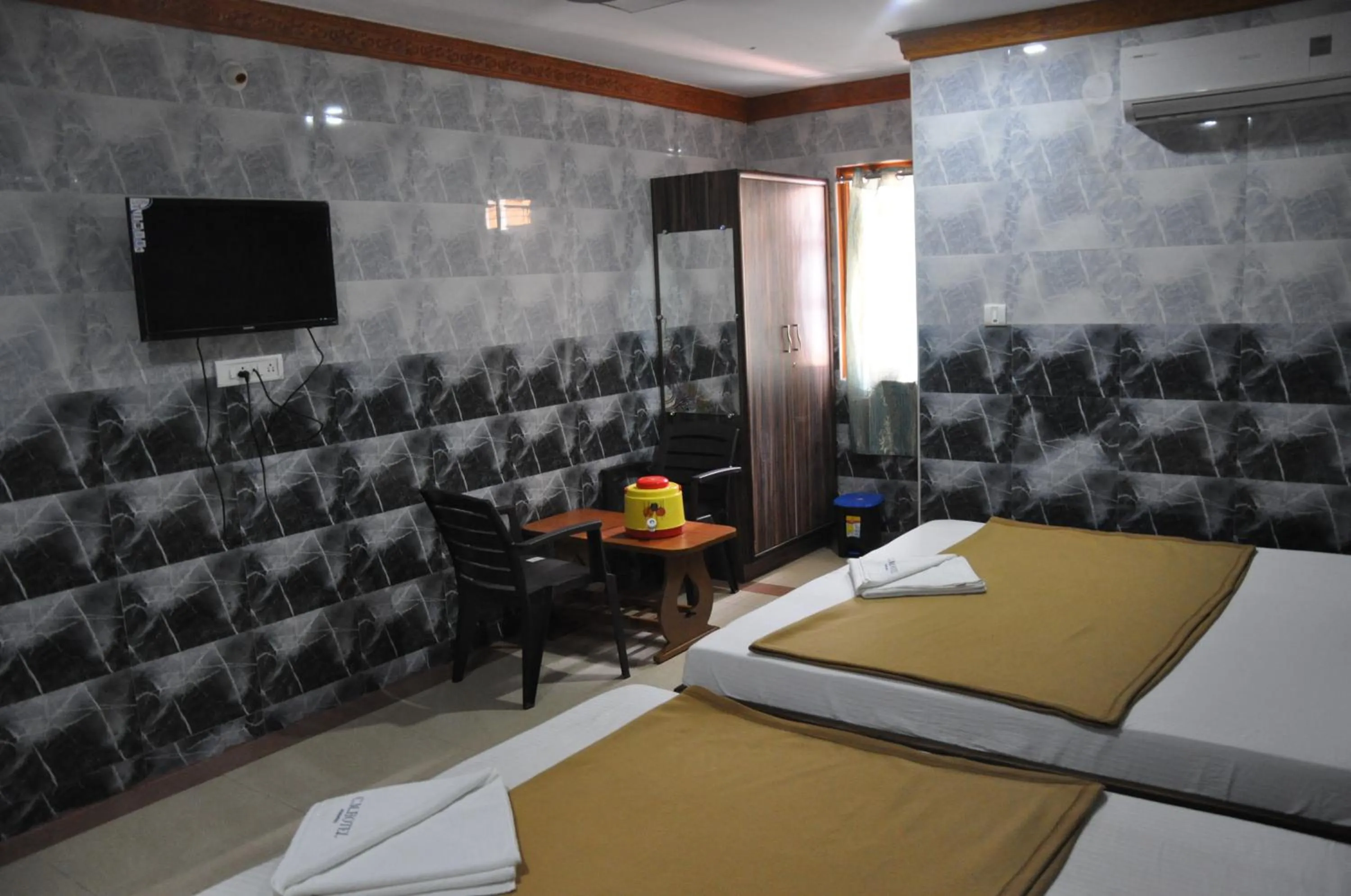 Bed in C M HOTEL NEW