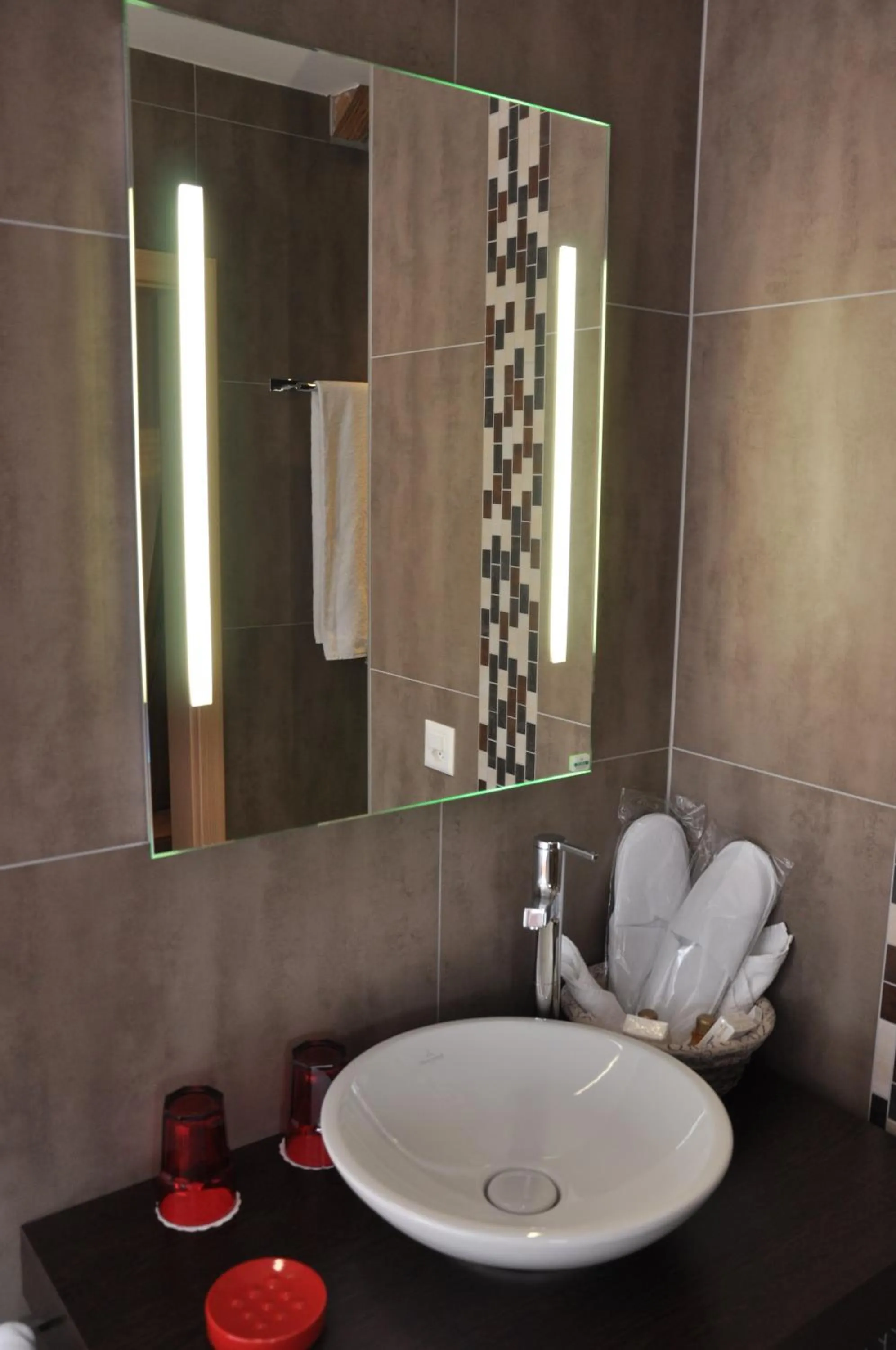 Bathroom in Le Relais du Château Monney