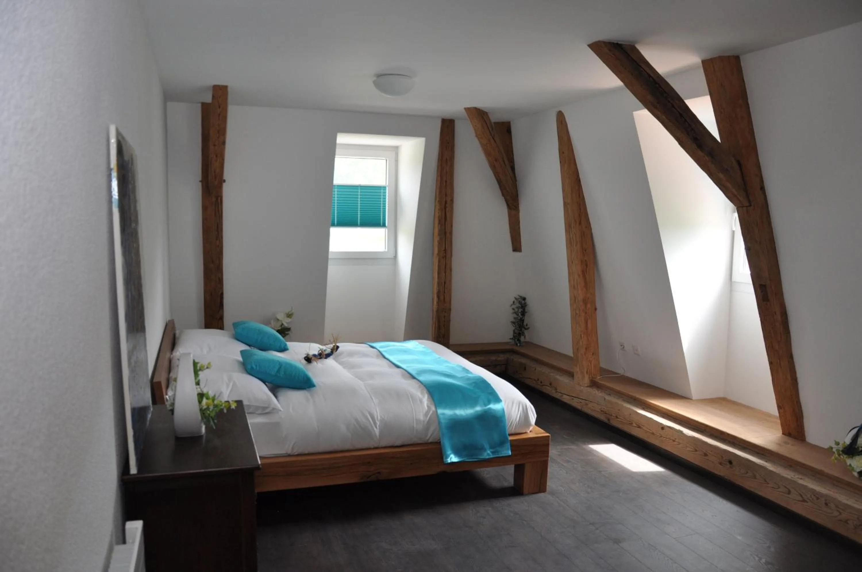 Bed in Le Relais du Château Monney