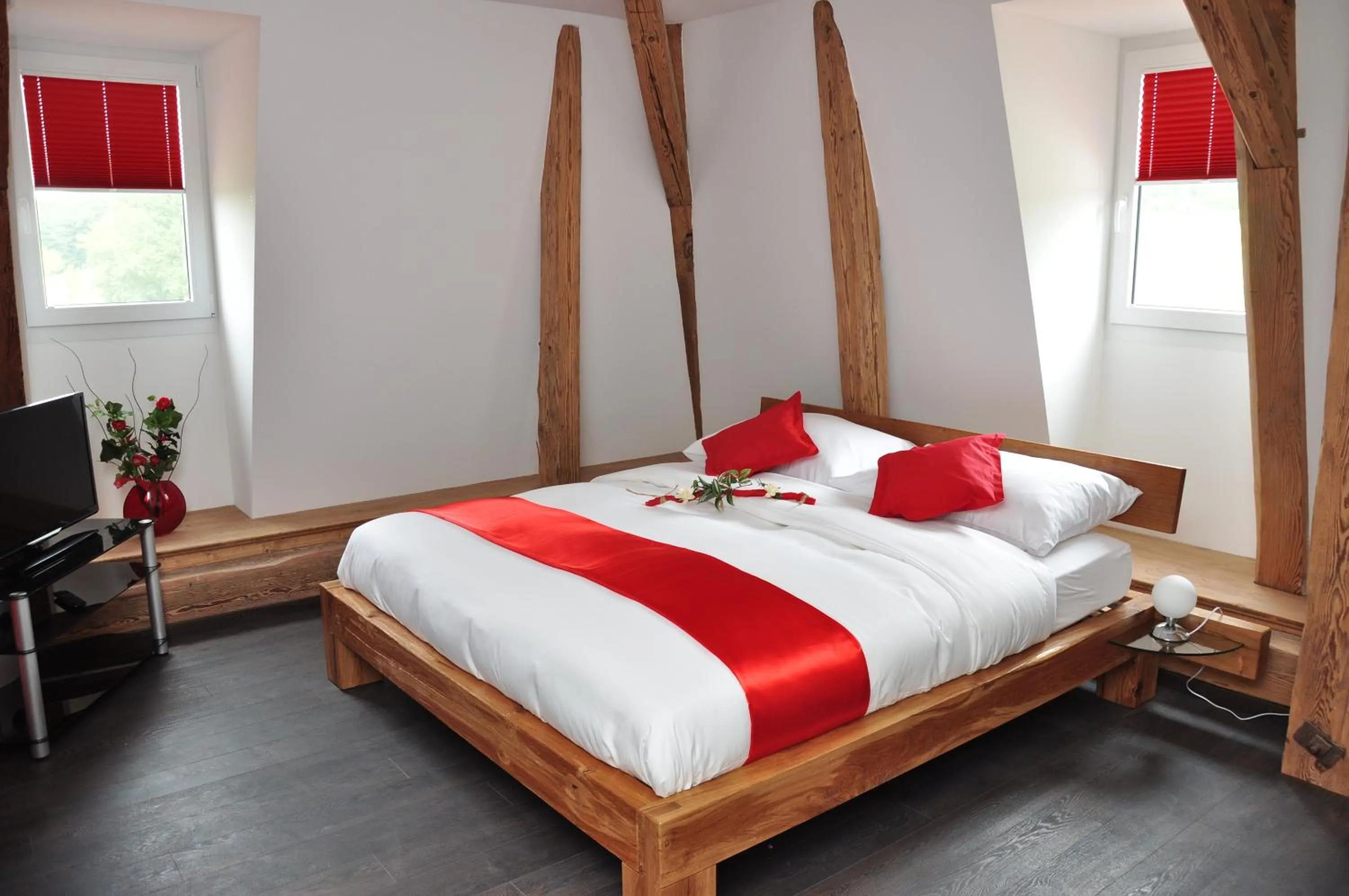 Bed in Le Relais du Château Monney