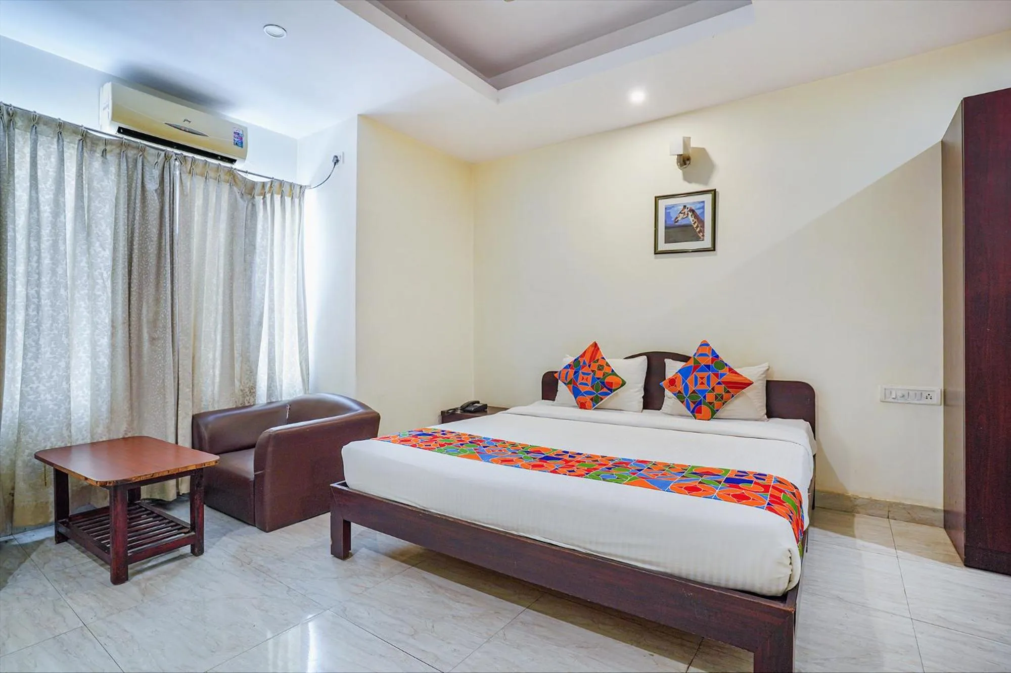 Bed in FabHotel Shreyas Inn - Kaikondrahalli Lake