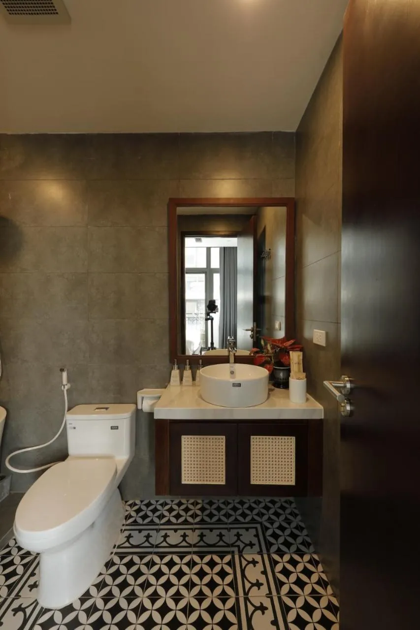 Toilet in Mersey Central Hanoi Apart'Hotel