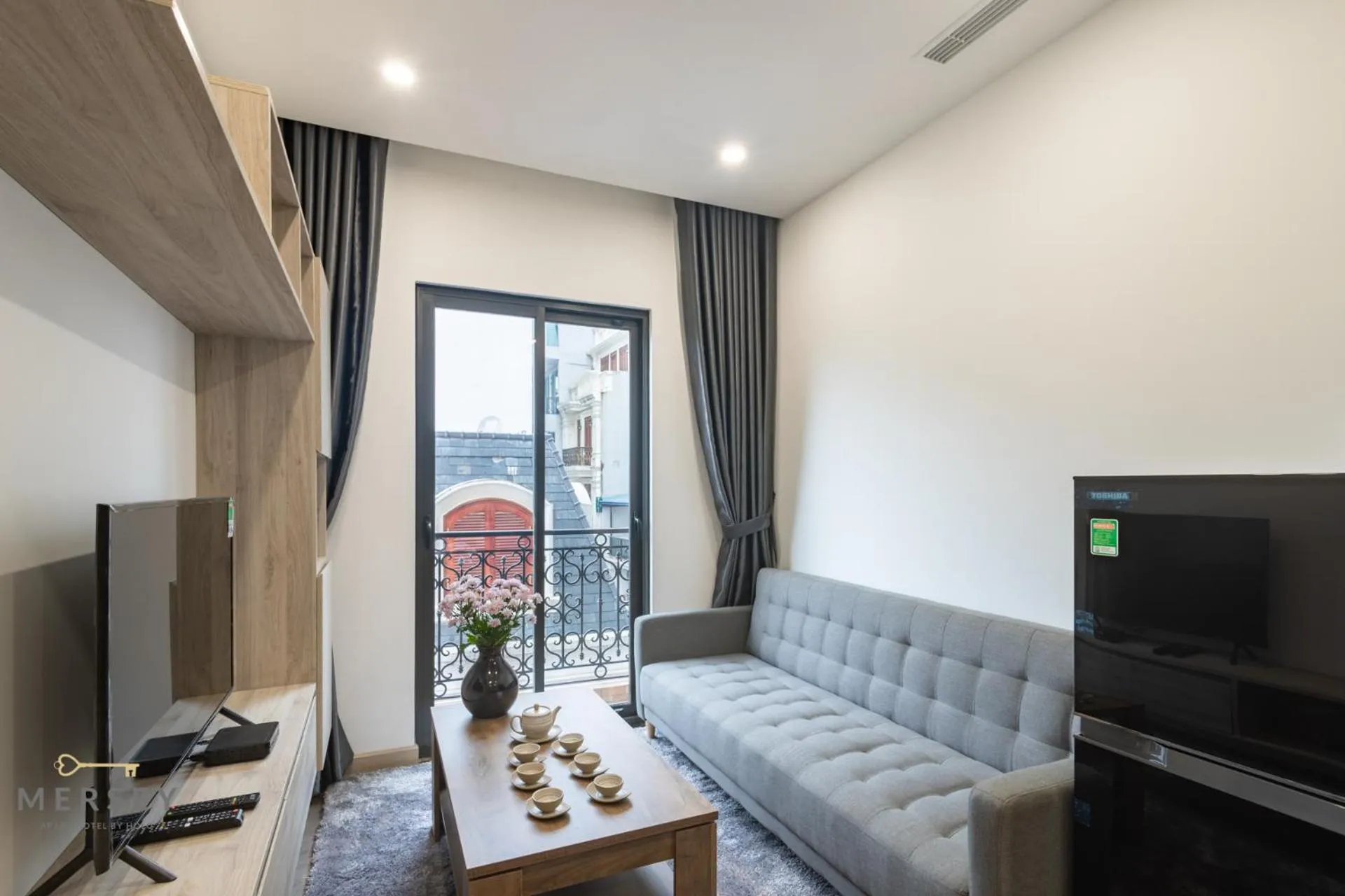 Communal lounge/ TV room in Mersey Central Hanoi Apart'Hotel