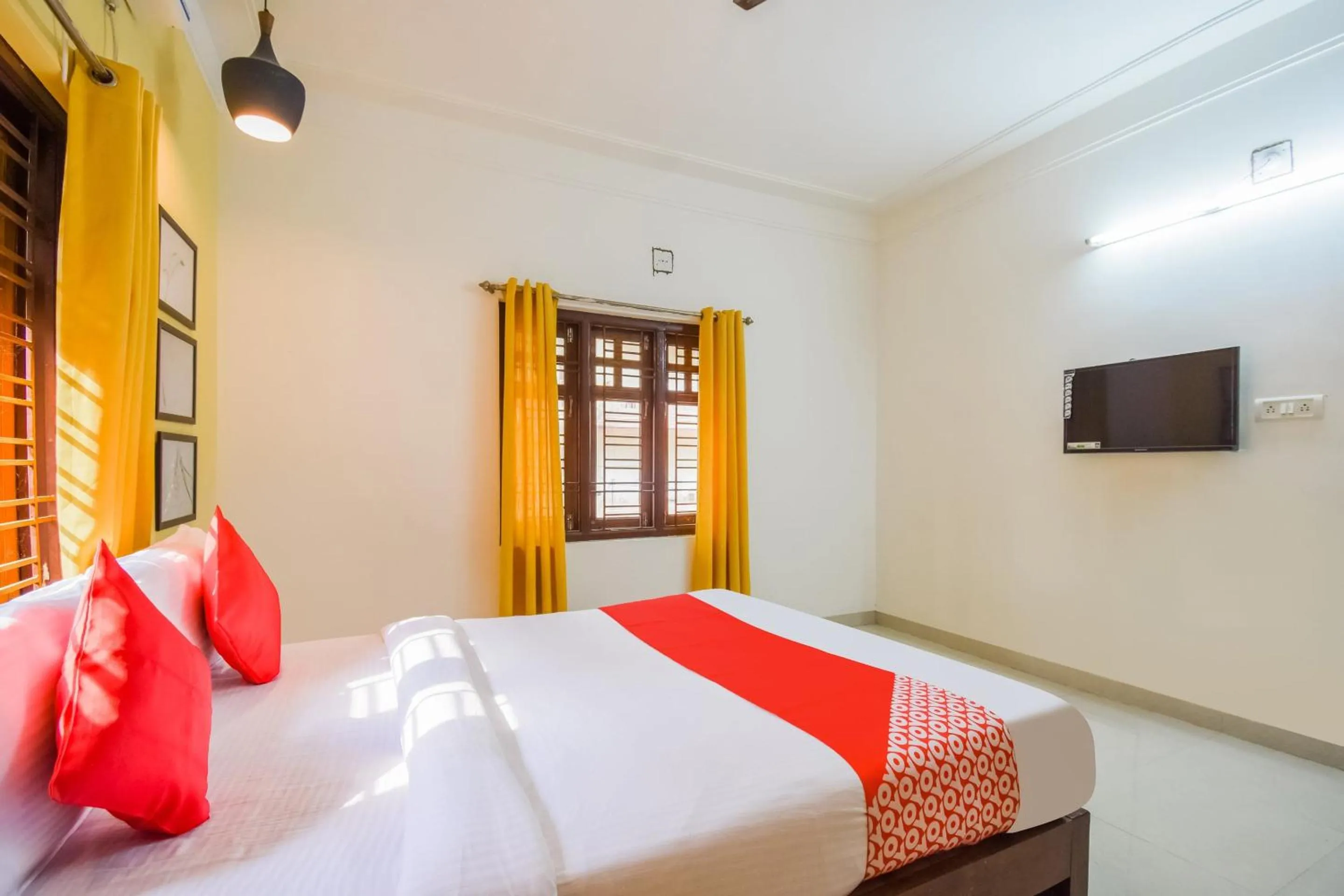 Bedroom in Hotel O Mks Inn