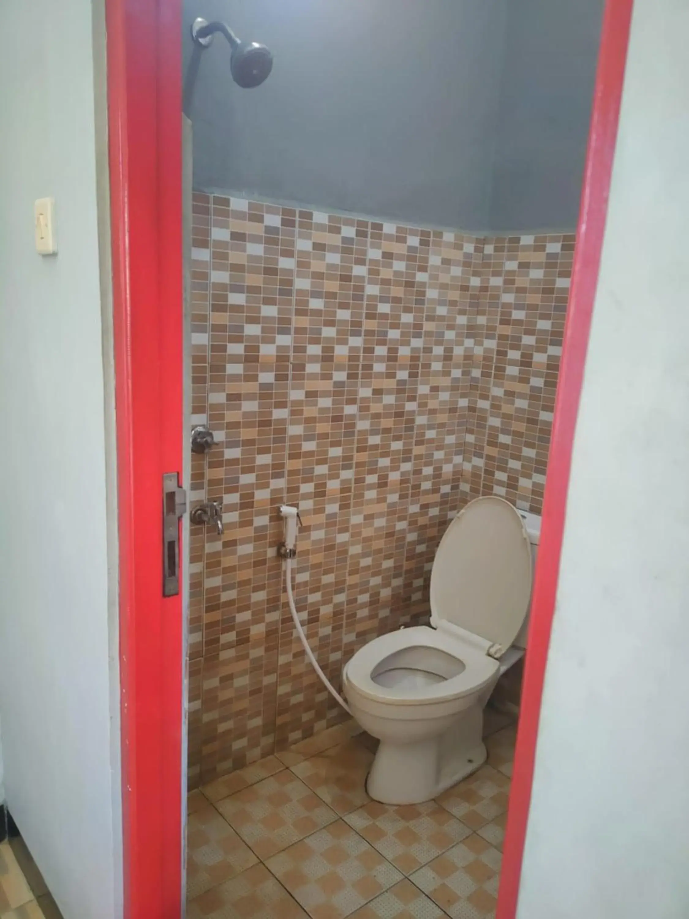 Bathroom in Adihan Homestay Mitra RedDoorz Bathroom in Adihan Homestay Mitra RedDoorz