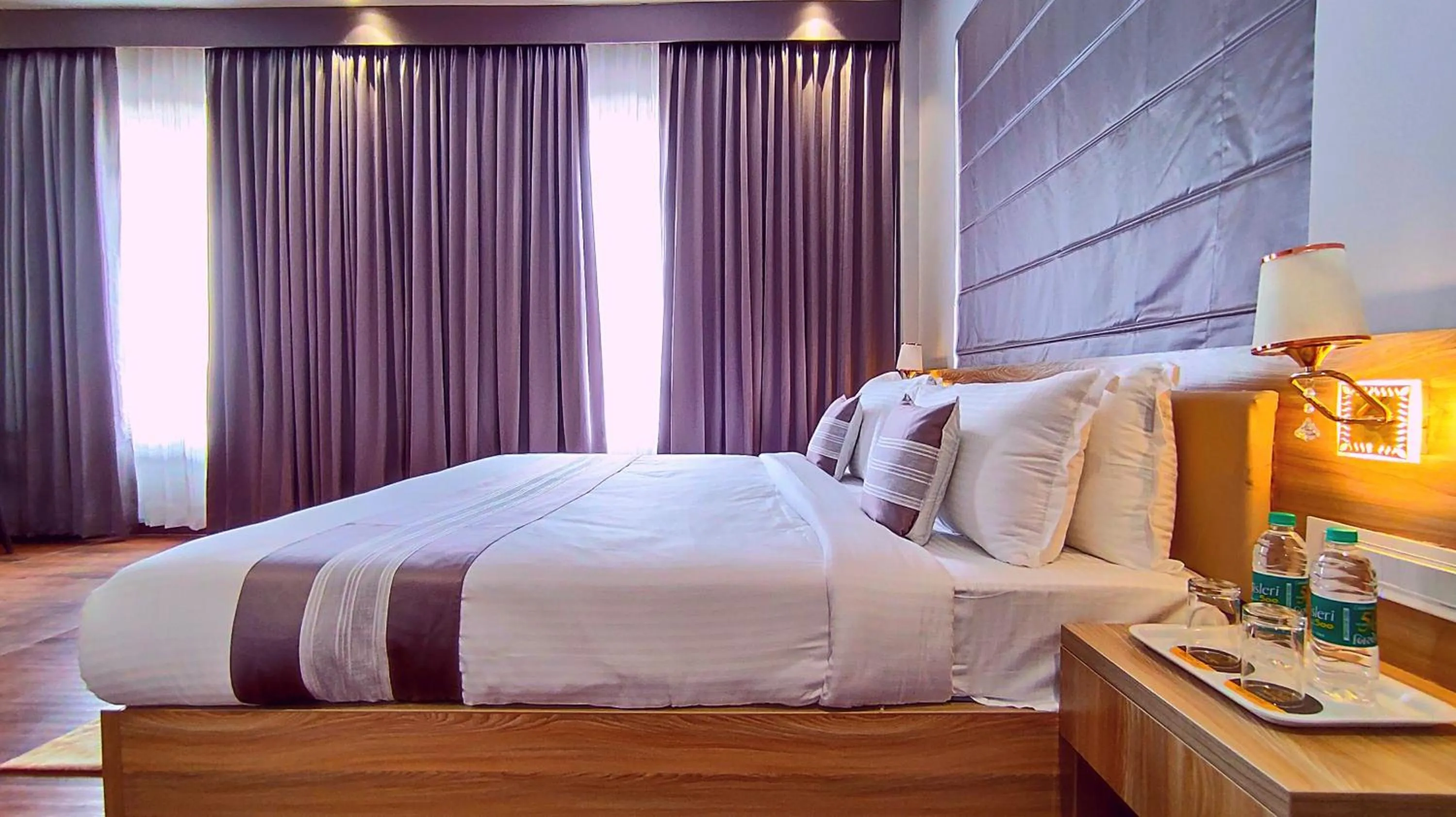 Bed in Sshubh Hotel Nathdwara