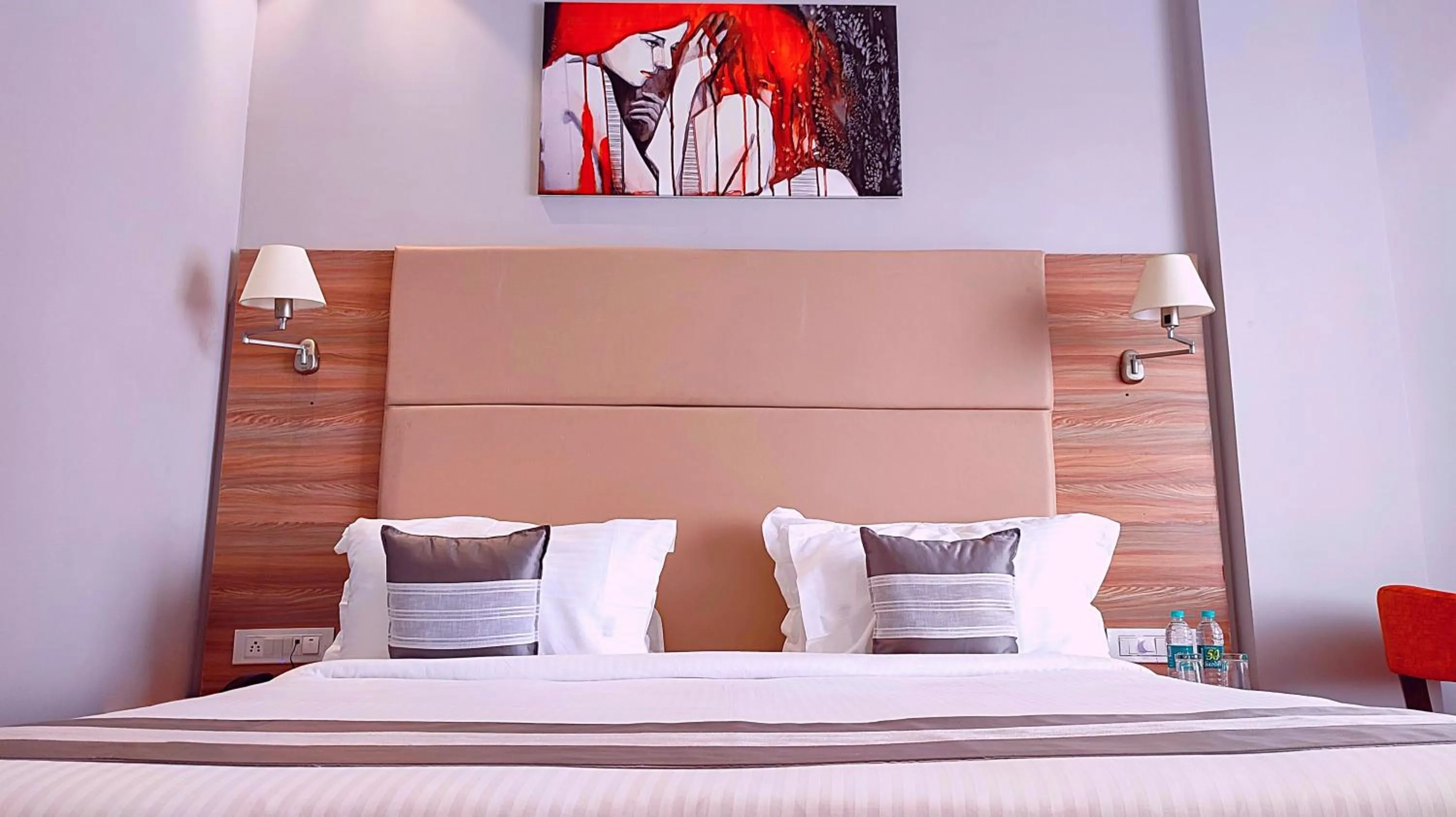 Bed in Sshubh Hotel Nathdwara