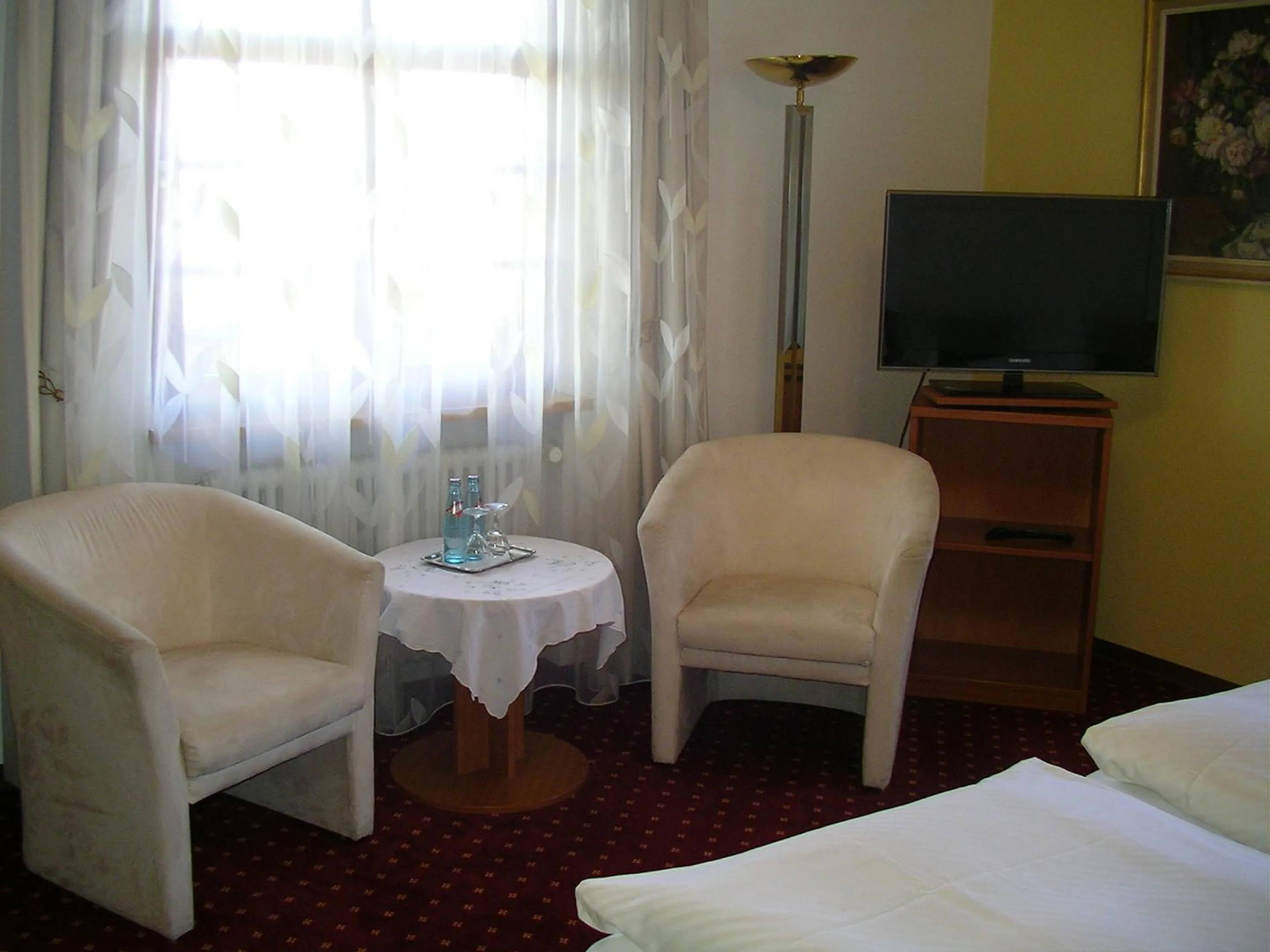 Seating area, Bed in Hotel Landgasthof Kranz
