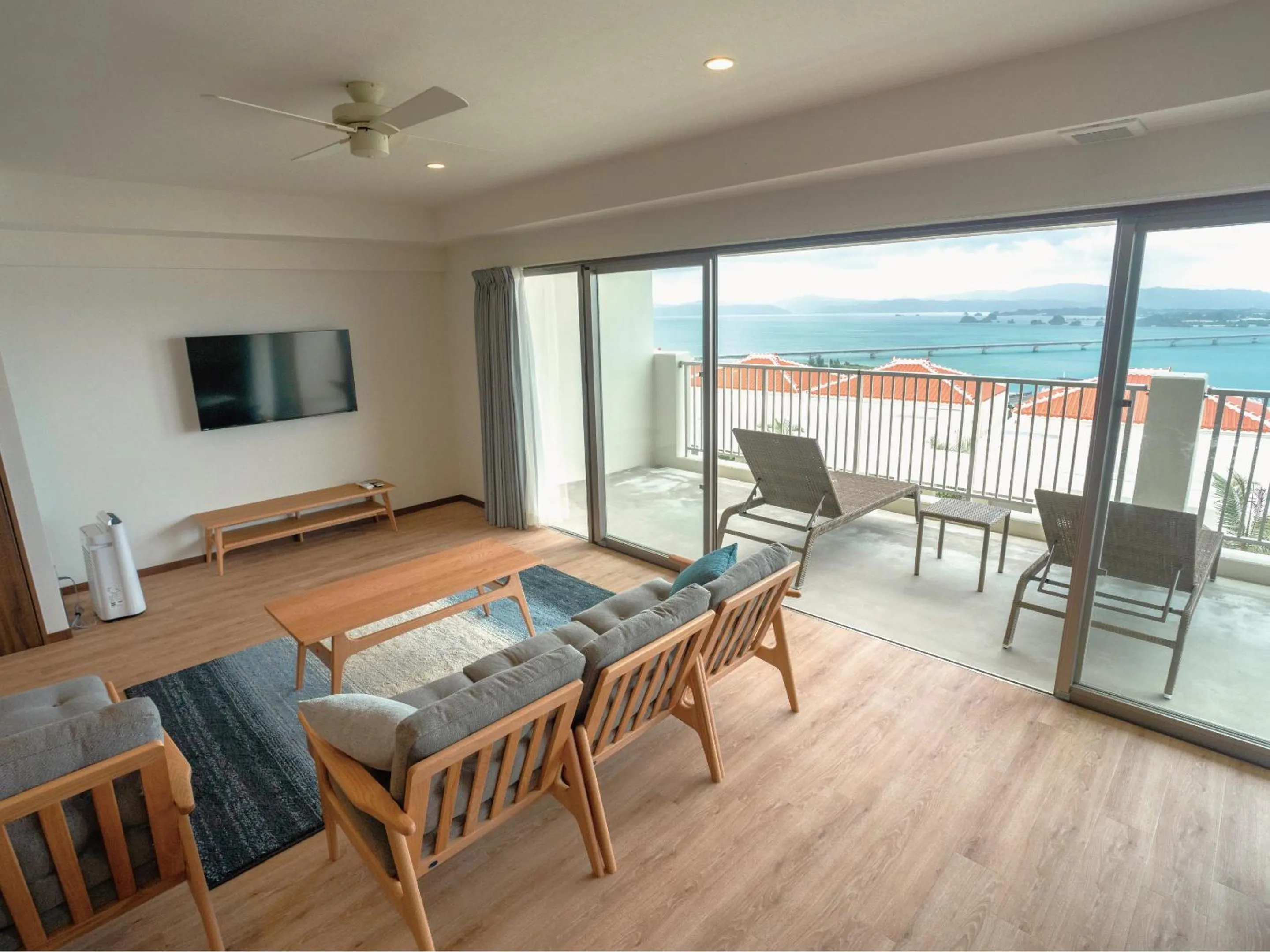 Living room in Private condo Kourijima by Coldio Smart Resort