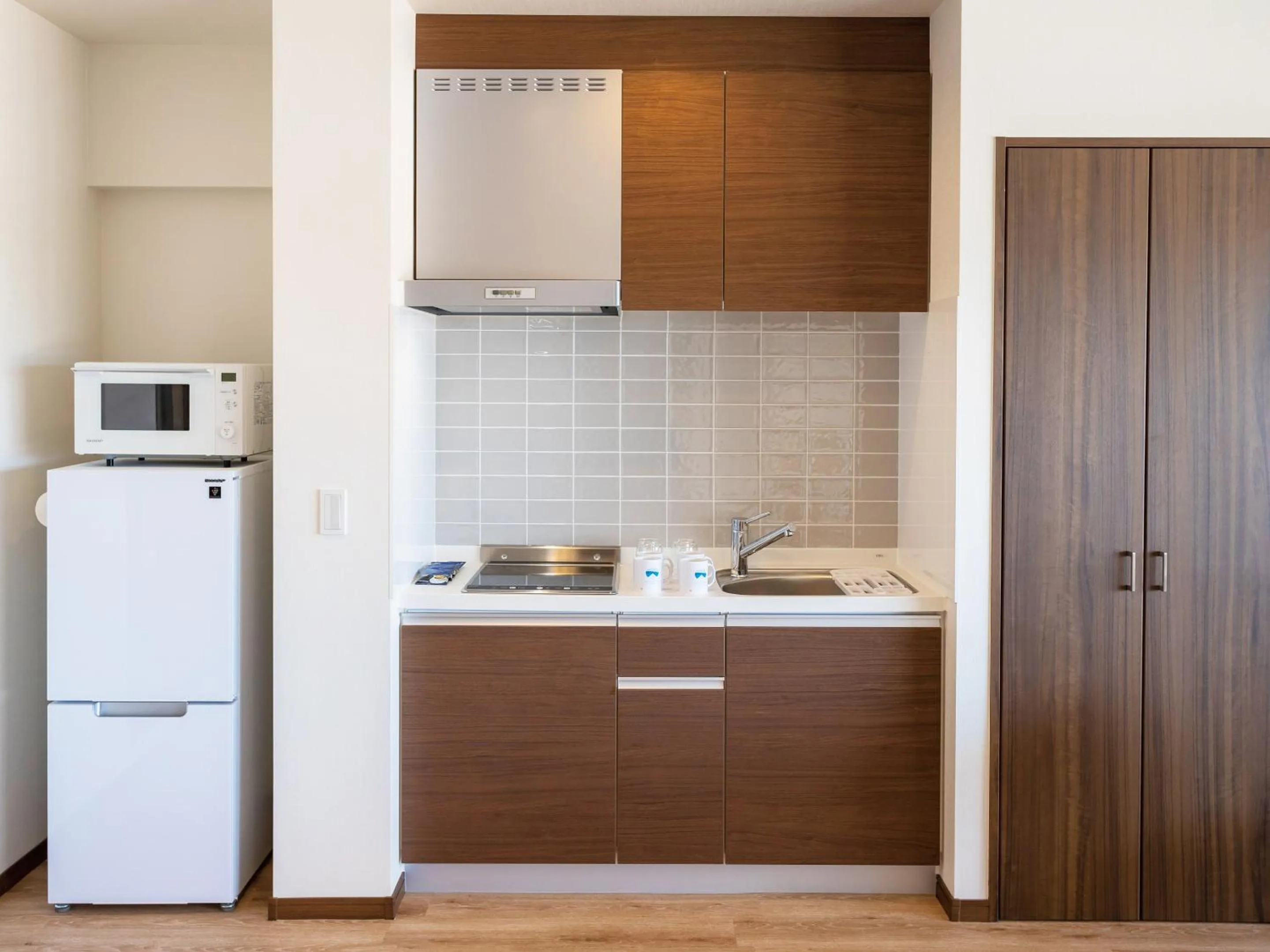 Kitchen or kitchenette in Private condo Kourijima by Coldio Smart Resort