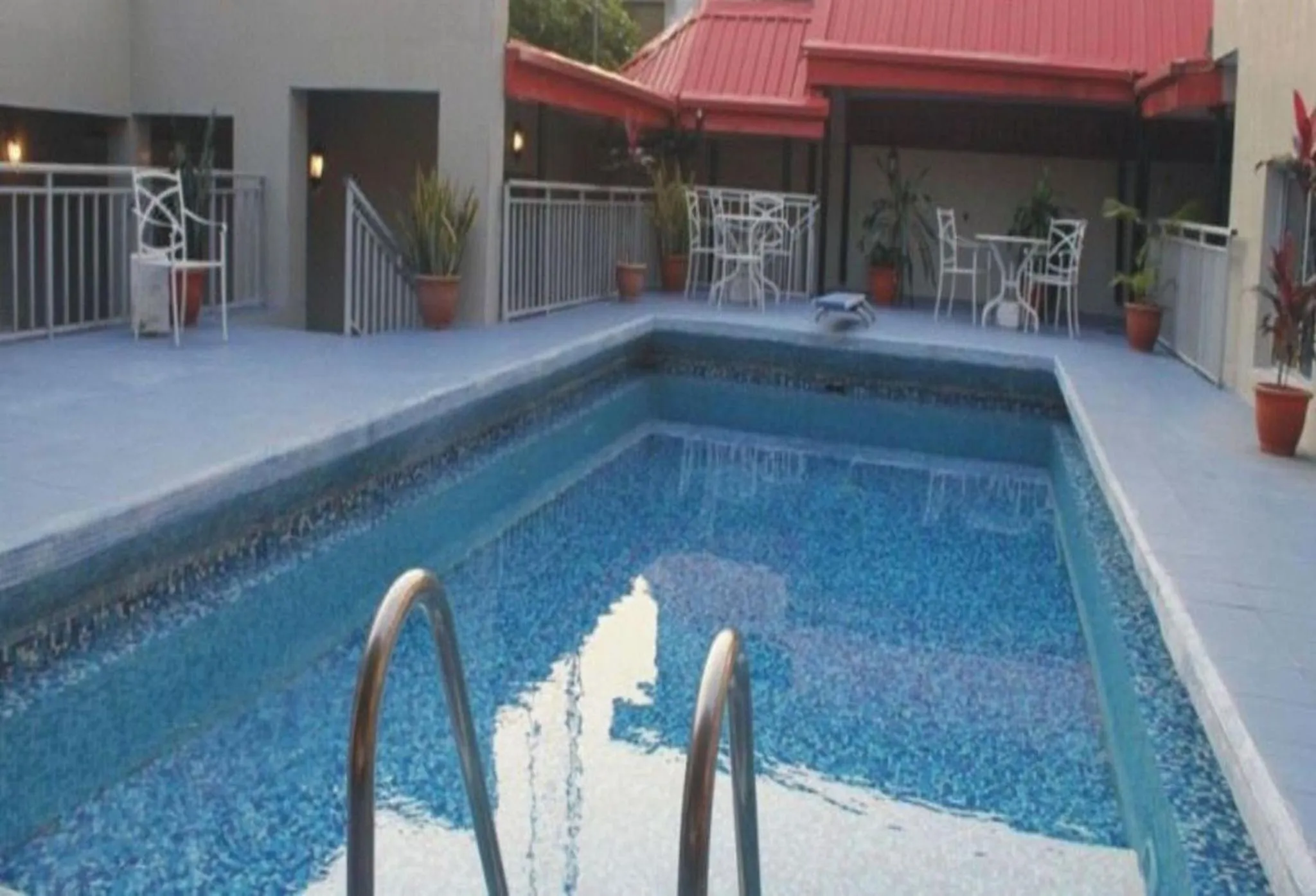 Swimming pool in Room in Lodge - Ambassadors Hotel Ikoyi