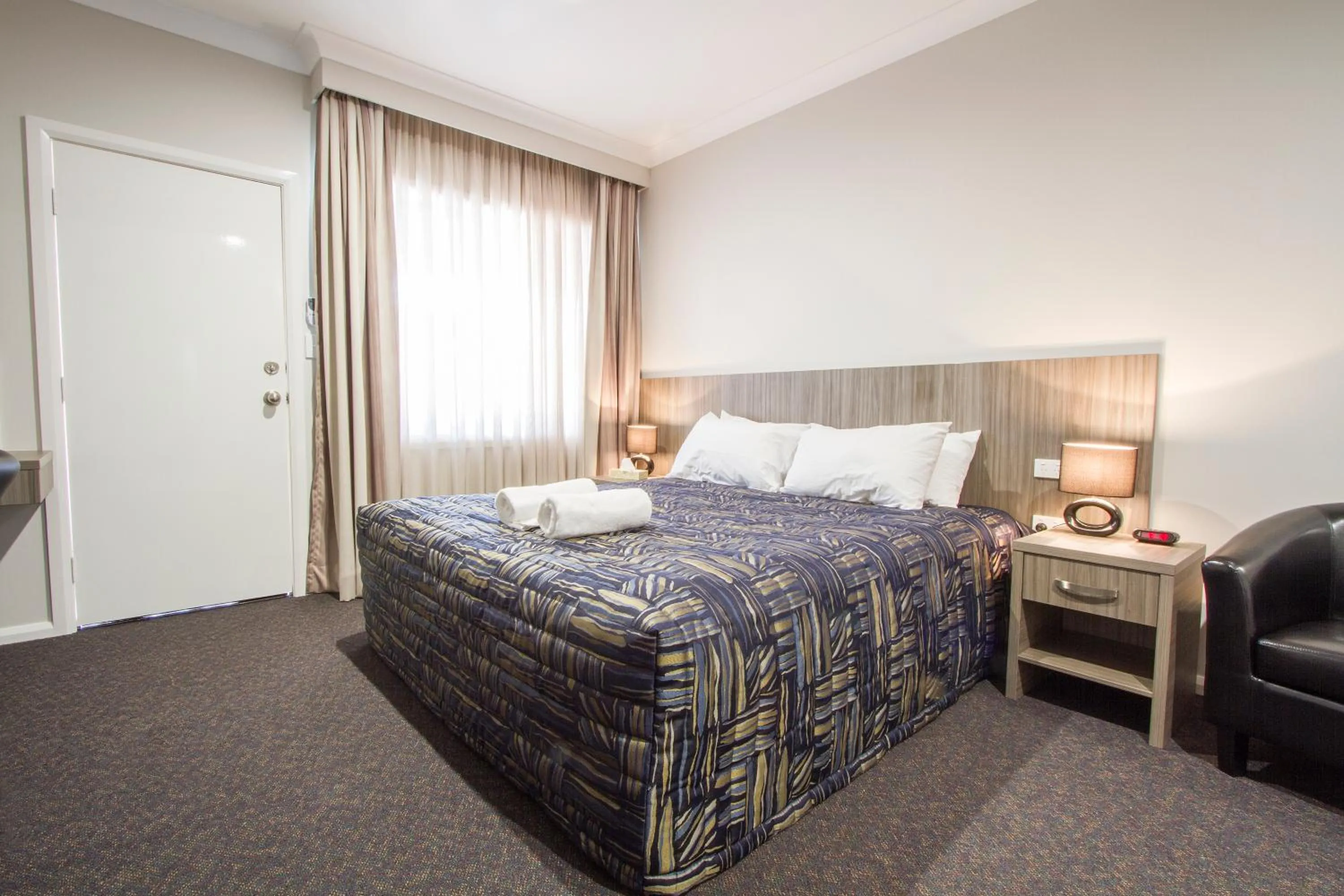 Bed in Harvest Lodge Motel - Gunnedah