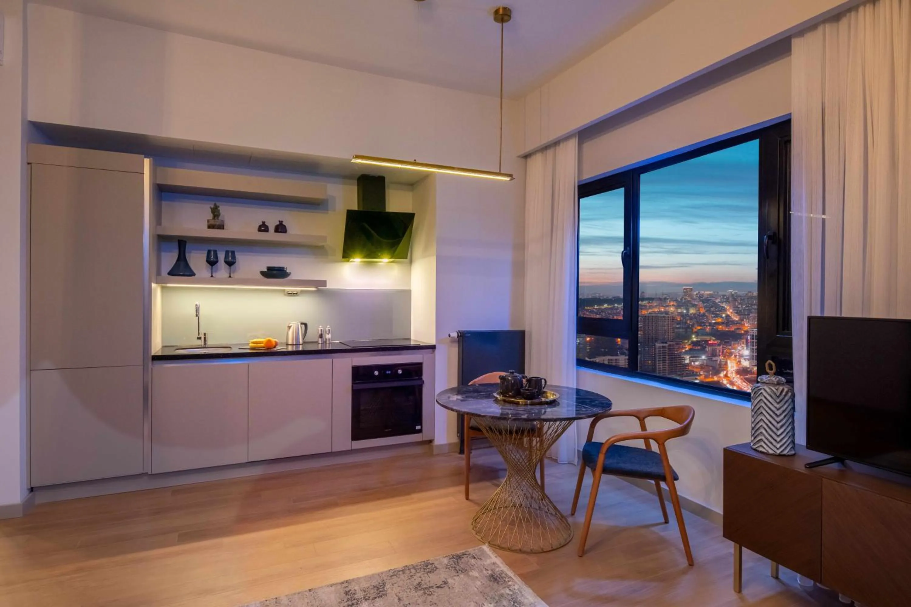 TV and multimedia in G Tower Furnished Apartment Rentals