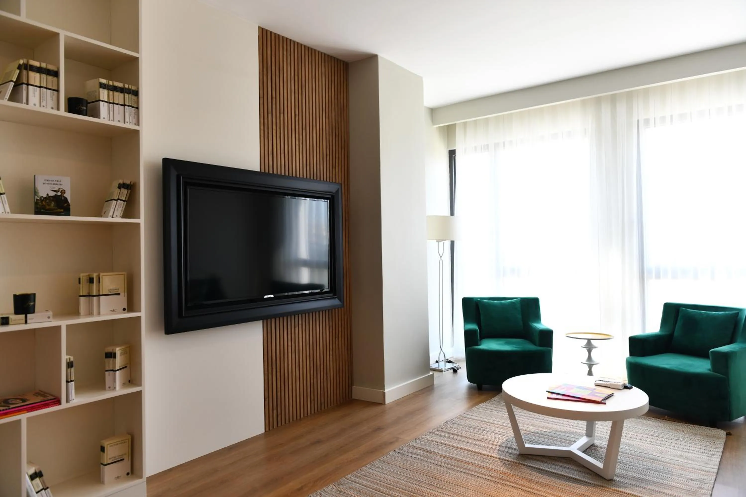 Communal lounge/ TV room in G Tower Furnished Apartment Rentals