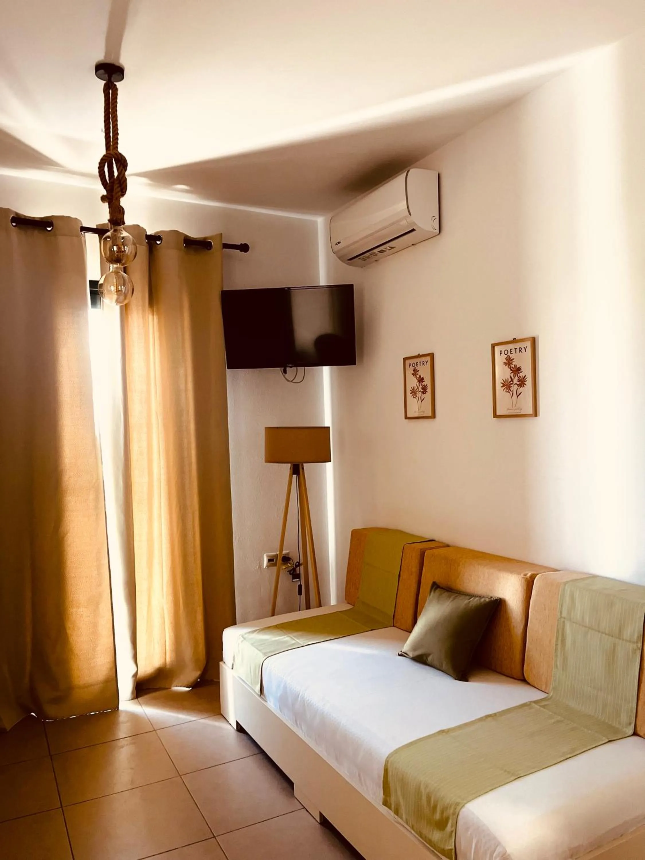 Bed in Myrthe Apartments