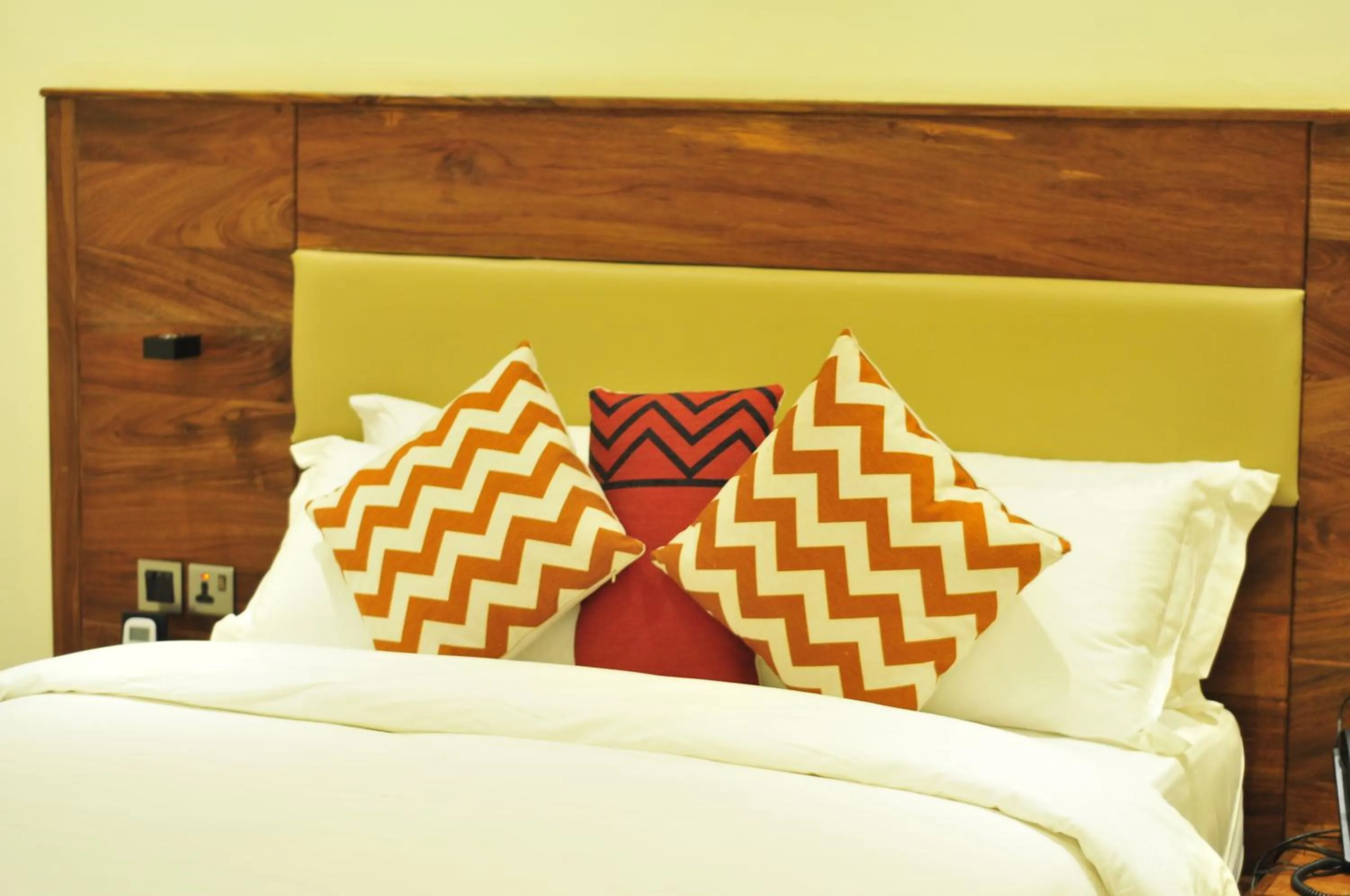 Bed in Millennium Terrace Hotel