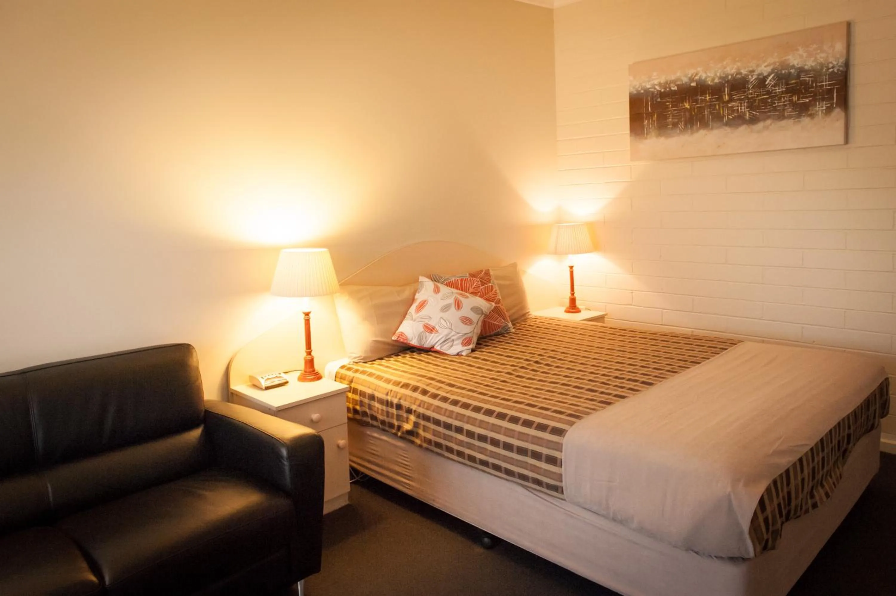 Bed in Ambassador Motor Inn