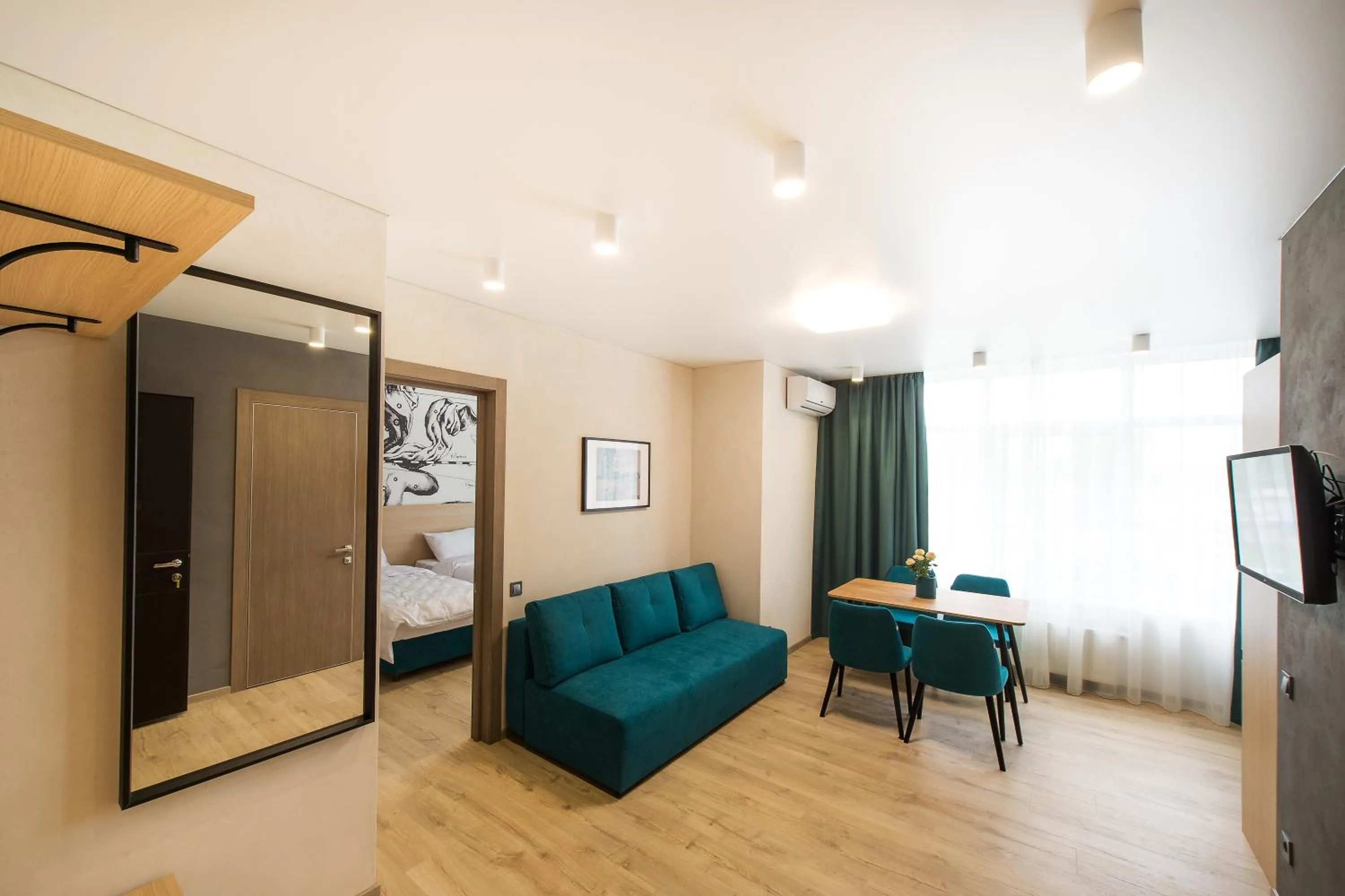 Living room, Bed in ORION apartments