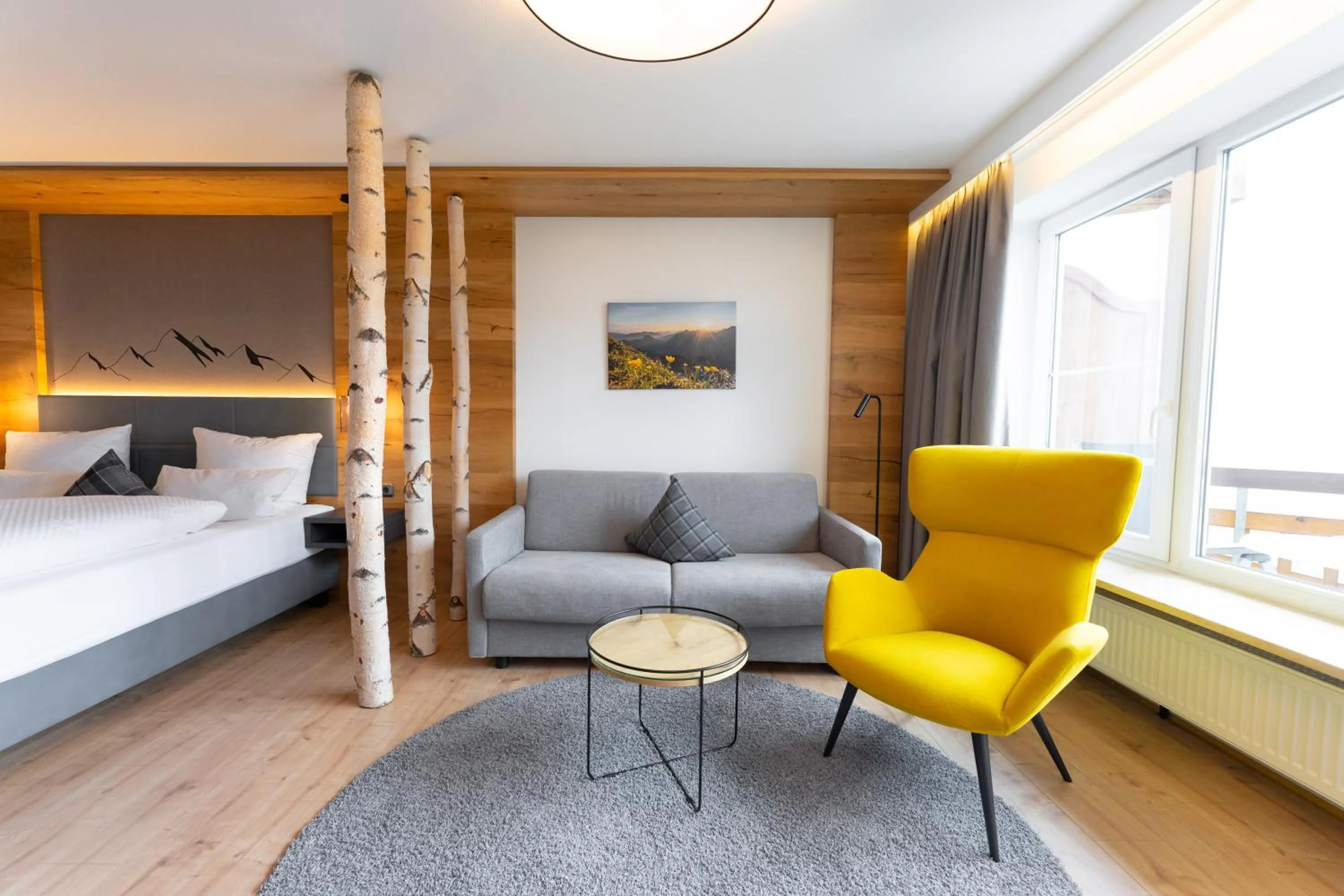 Living room, Bed in Alpenhof Oberstdorf Hotel & SPA, Signature Collection by BW