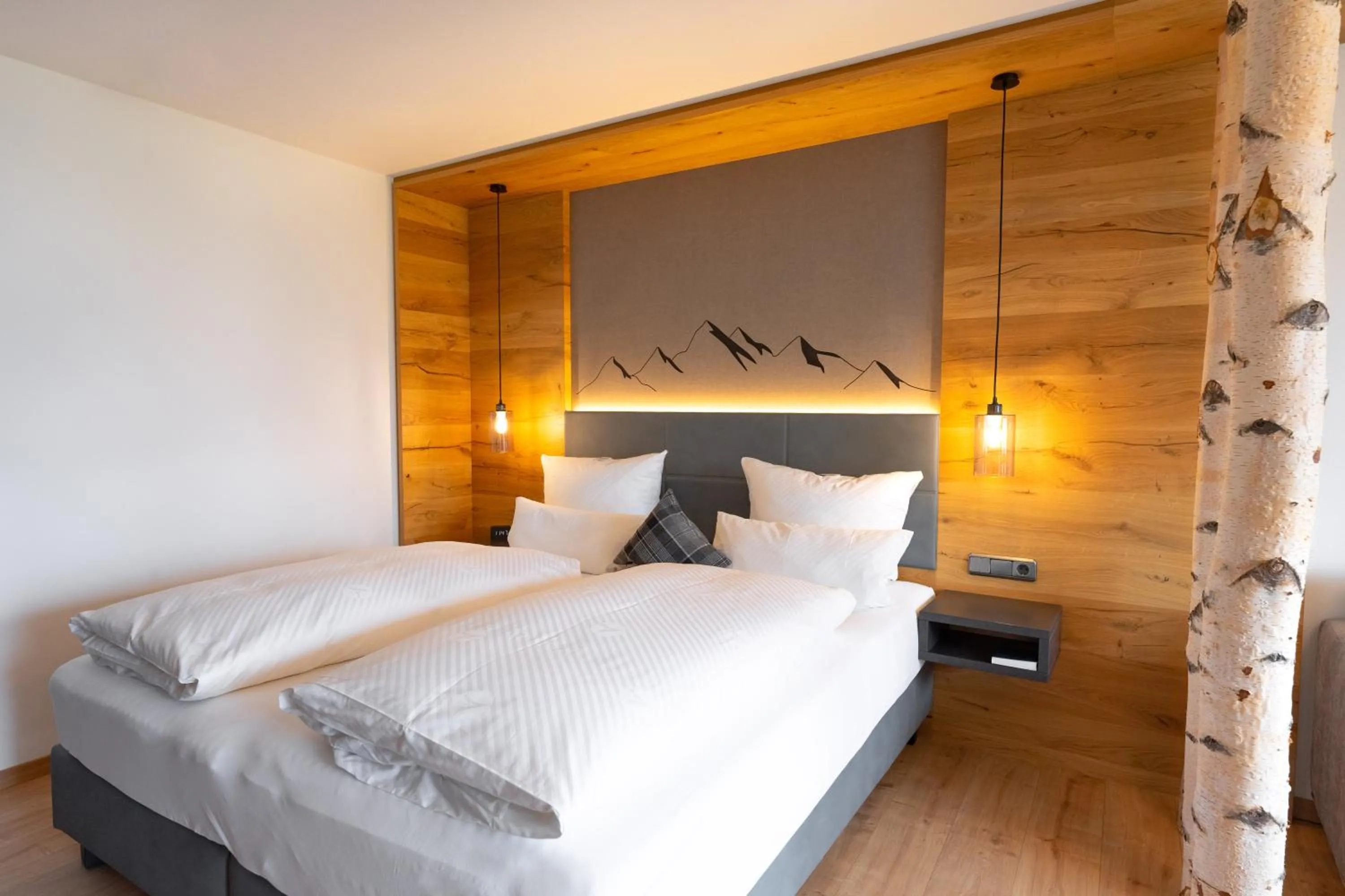 Bed in Alpenhof Oberstdorf Hotel & SPA, Signature Collection by BW