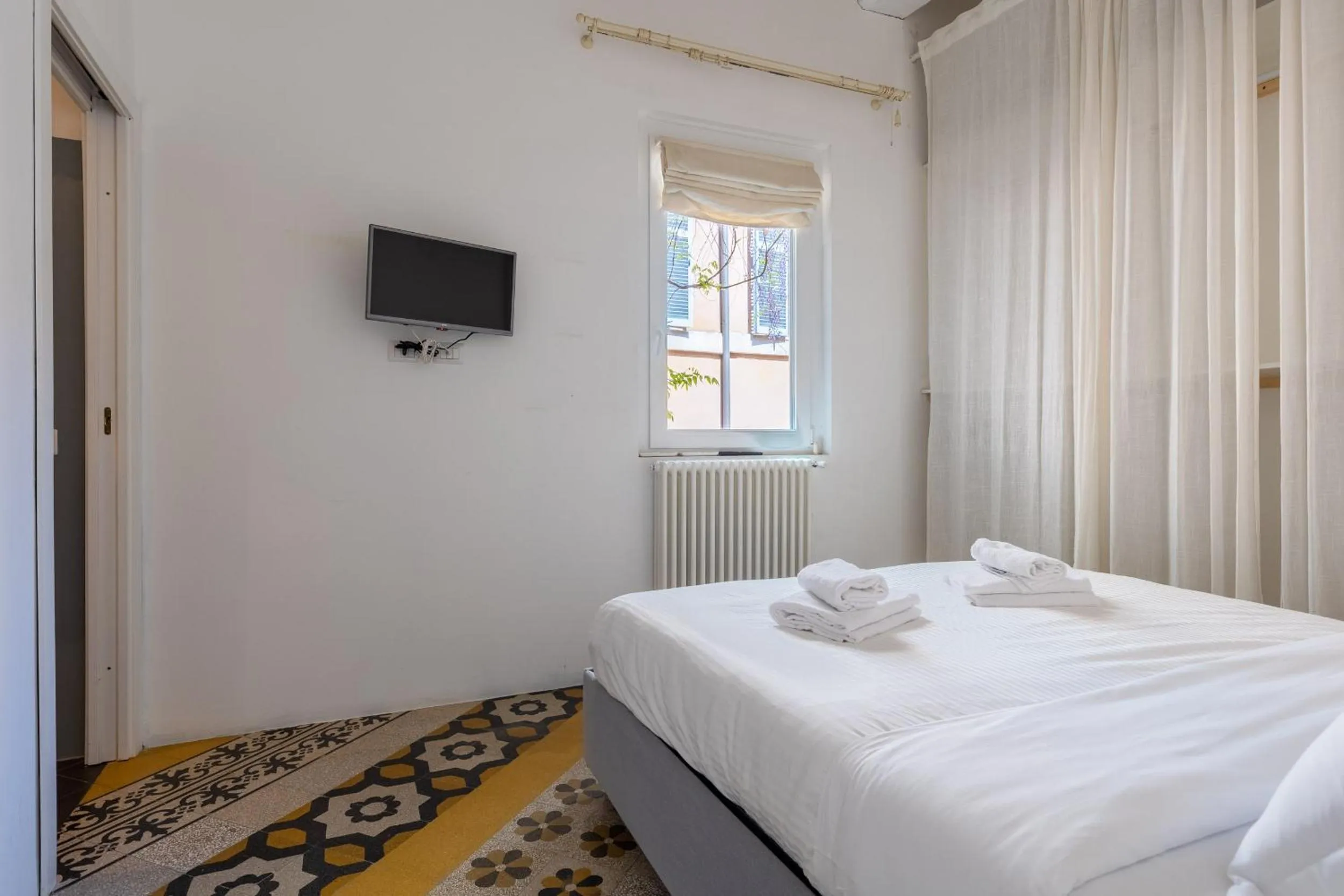 Bedroom, Bed in Navona Open Space Apartments