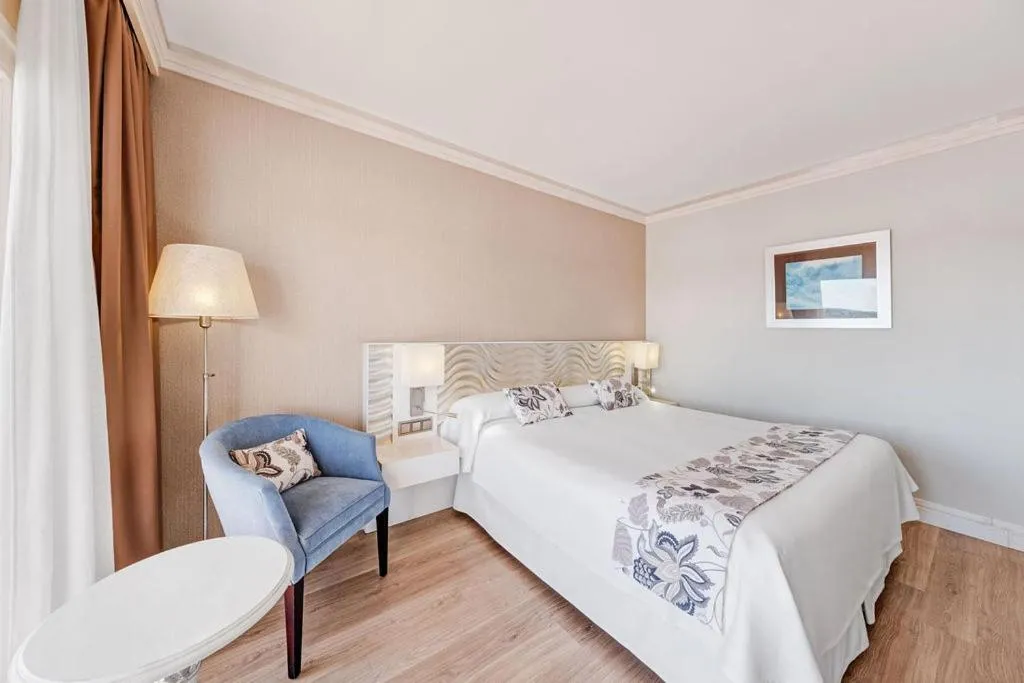 Bed in El Coto Boutique & Spa Hotel
