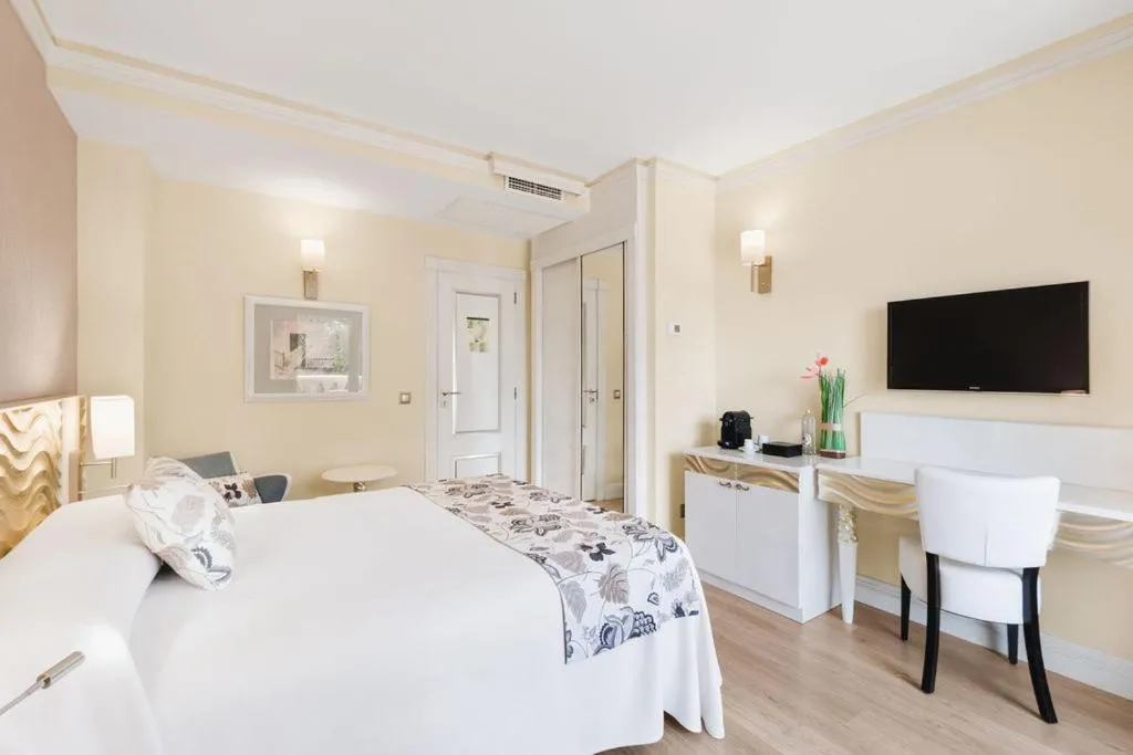 Bed in El Coto Boutique & Spa Hotel