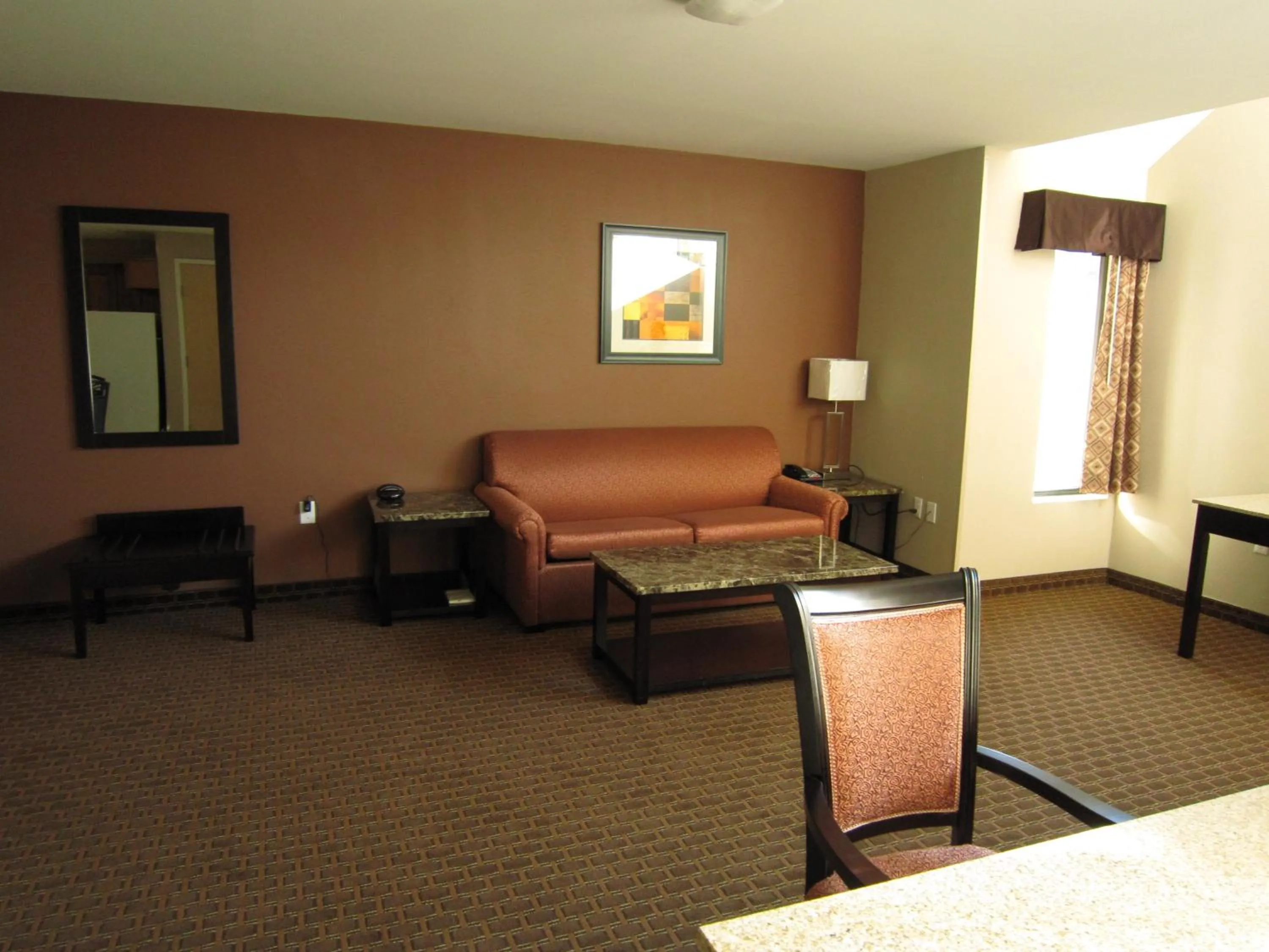 Living room, Bed in Red Carpet Inn and Suites Monmouth Junction