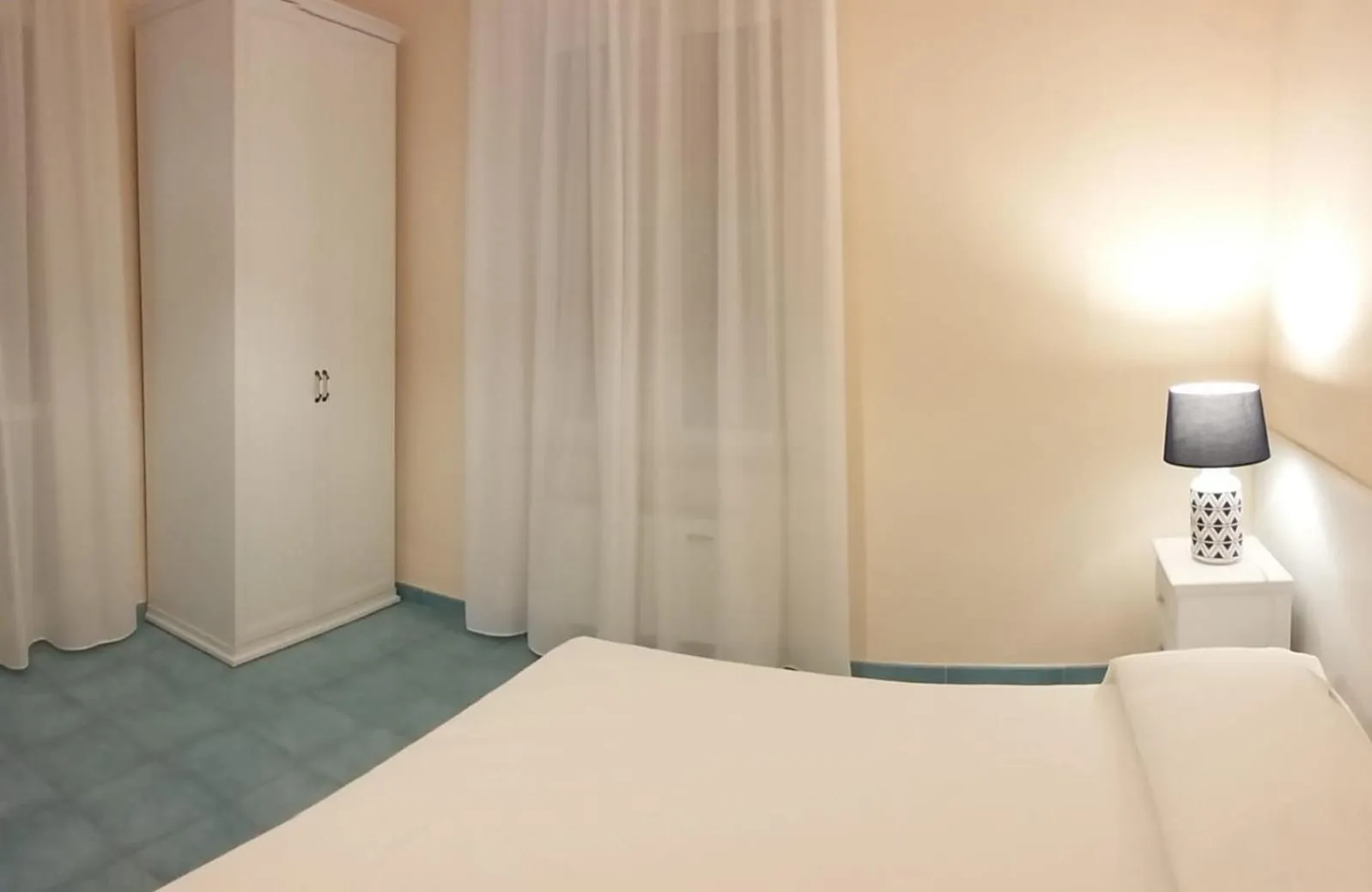 Bed in VILLA FLORA ARGENTARIO