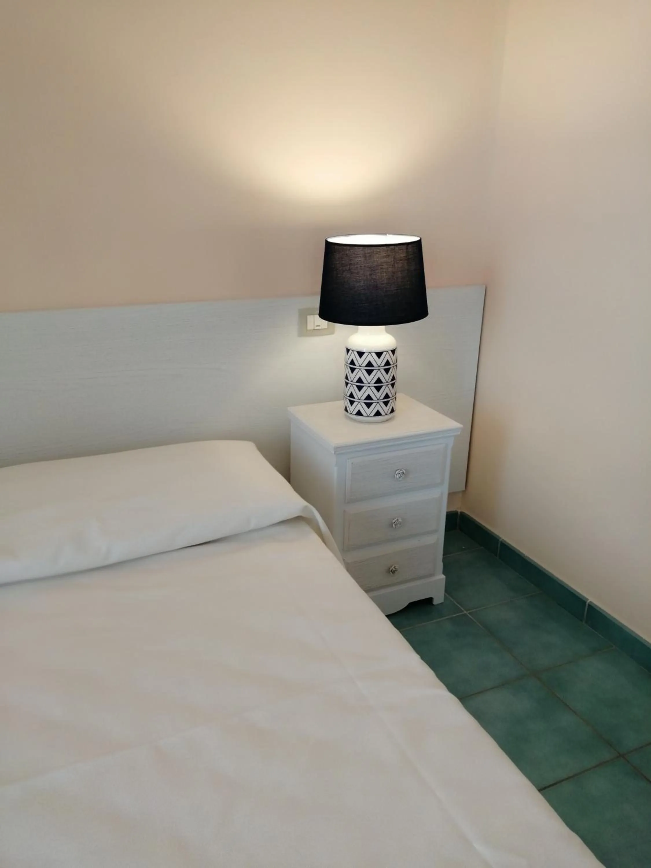 Bed in VILLA FLORA ARGENTARIO