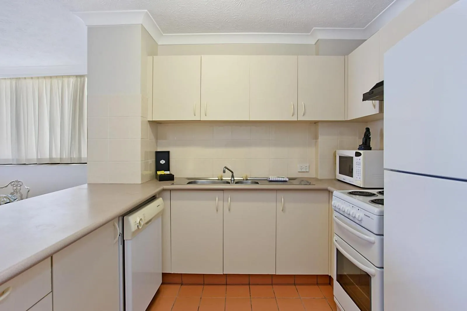 Kitchen or kitchenette in Aries Holiday Apartments