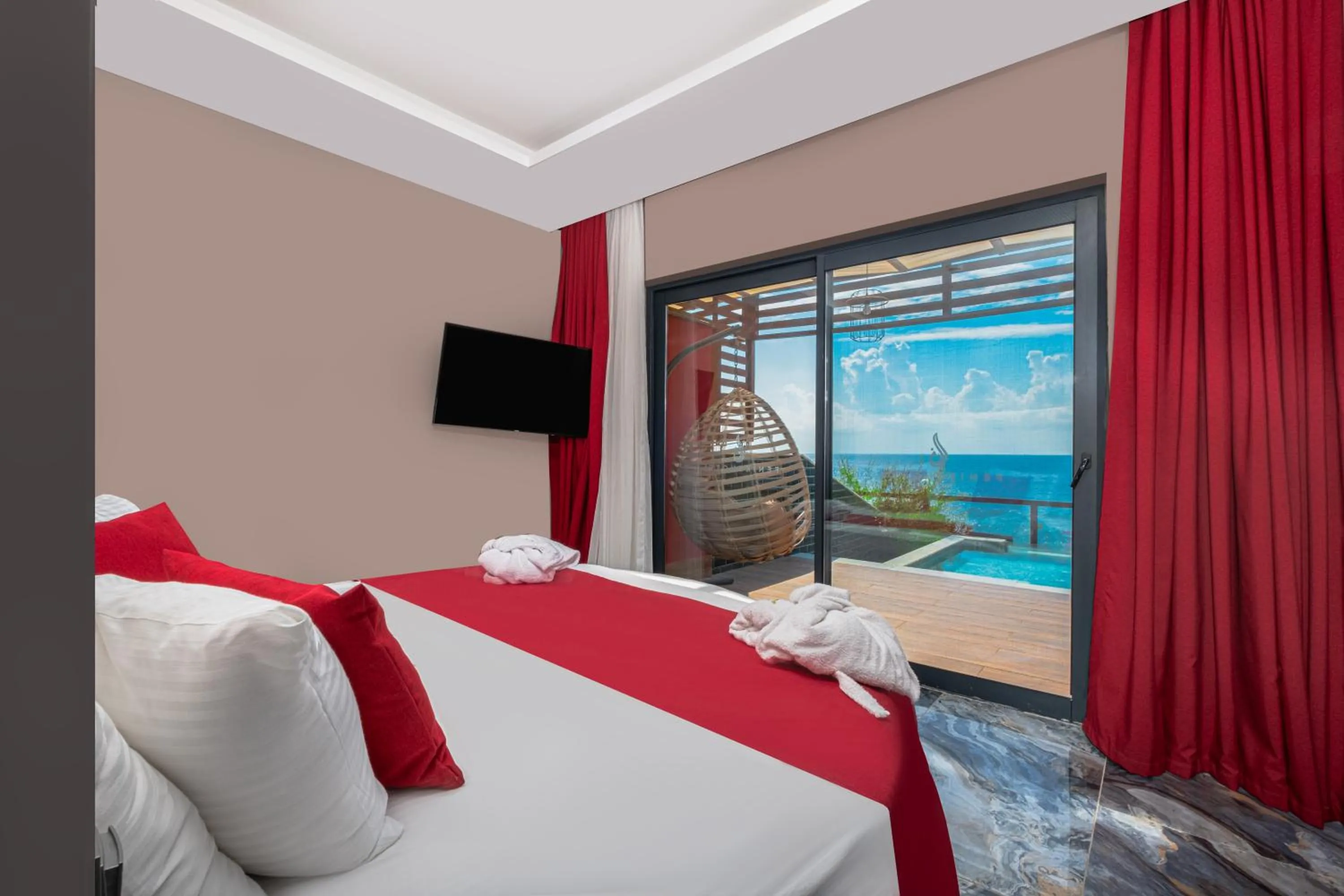 Communal lounge/ TV room, Bed in Feniks Priority Hotel -All Inclusive