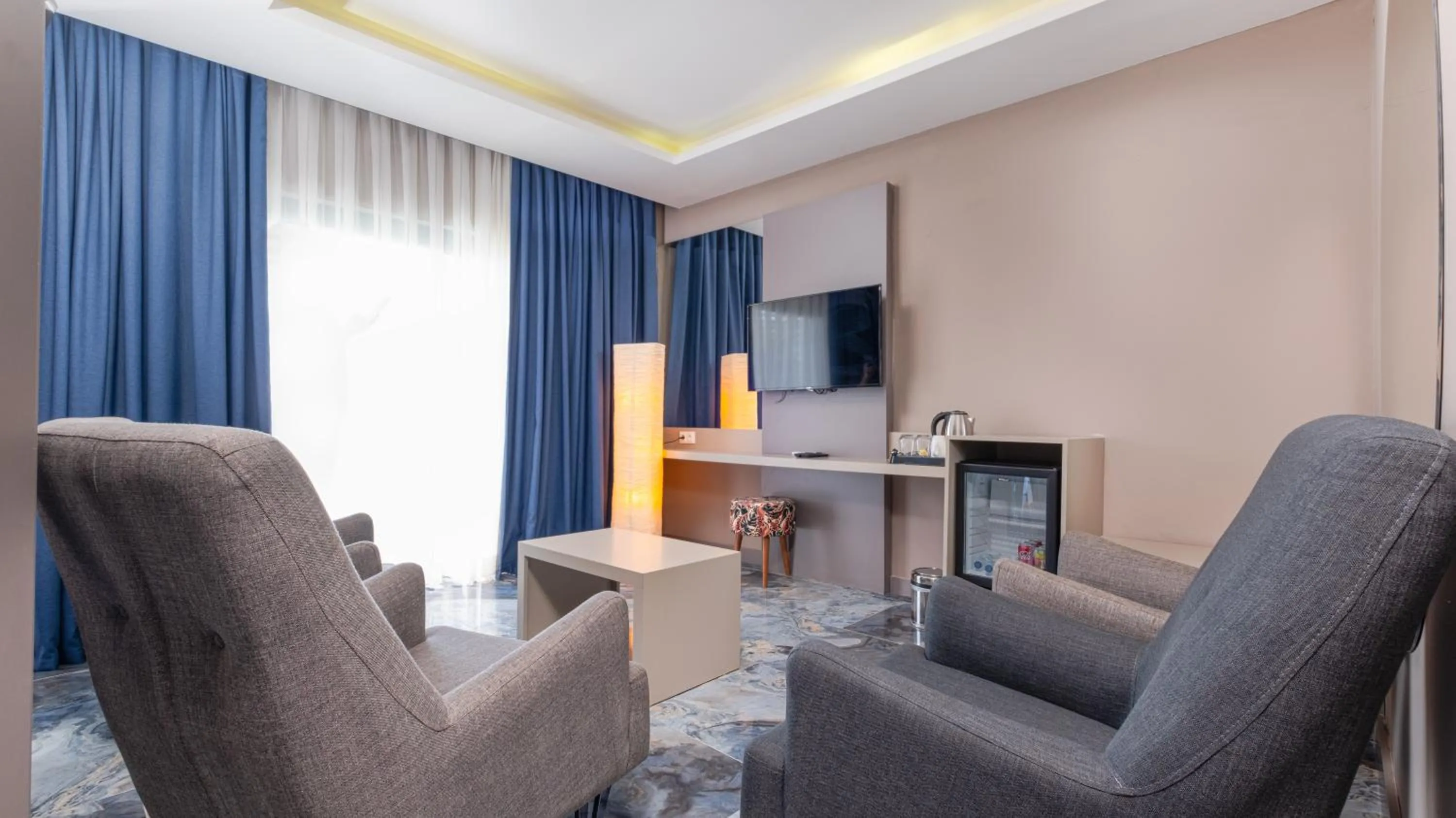 Communal lounge/ TV room in Feniks Priority Hotel -All Inclusive