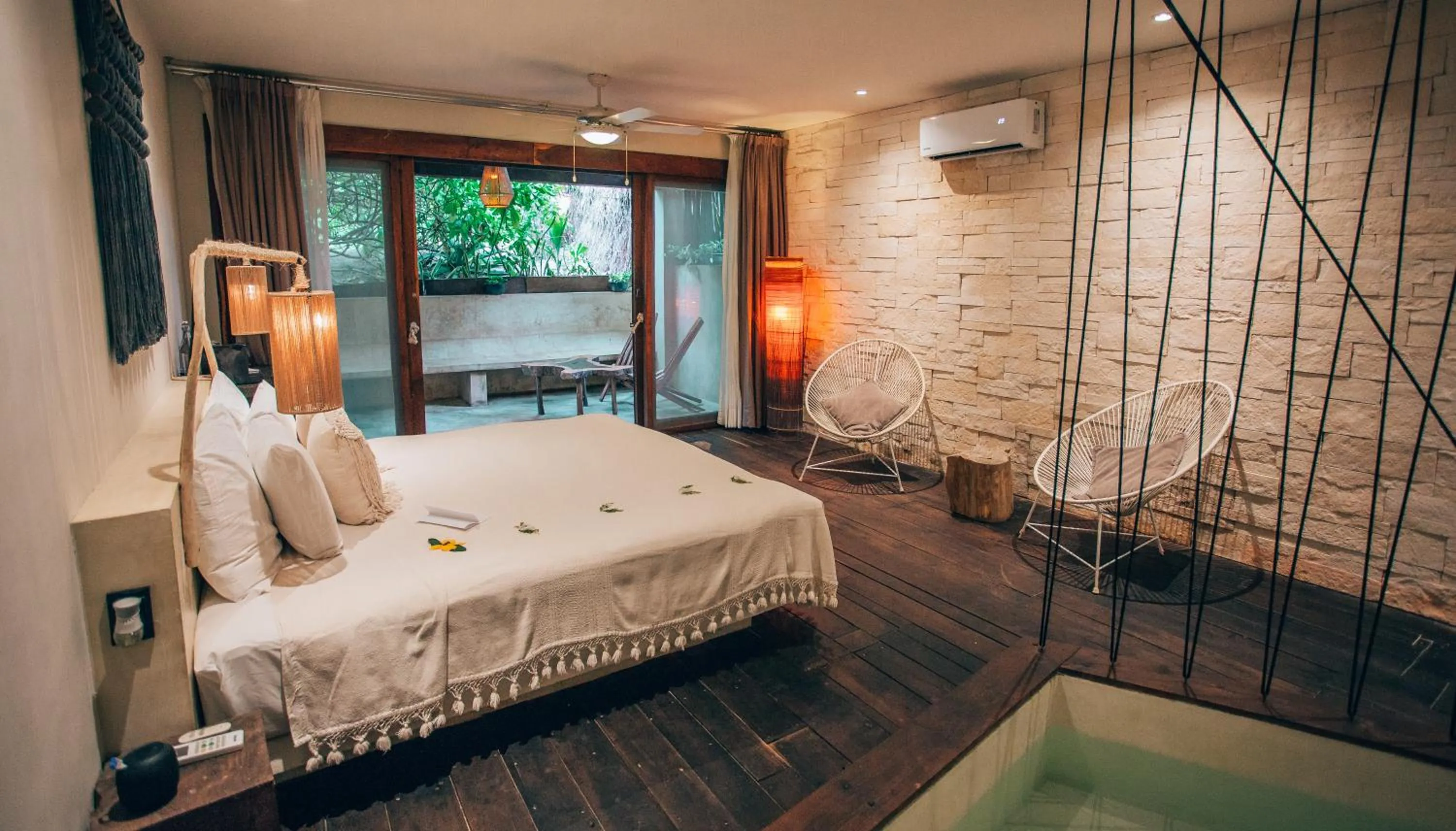 Photo of the whole room, Bed in Orchid House Tulum Beach