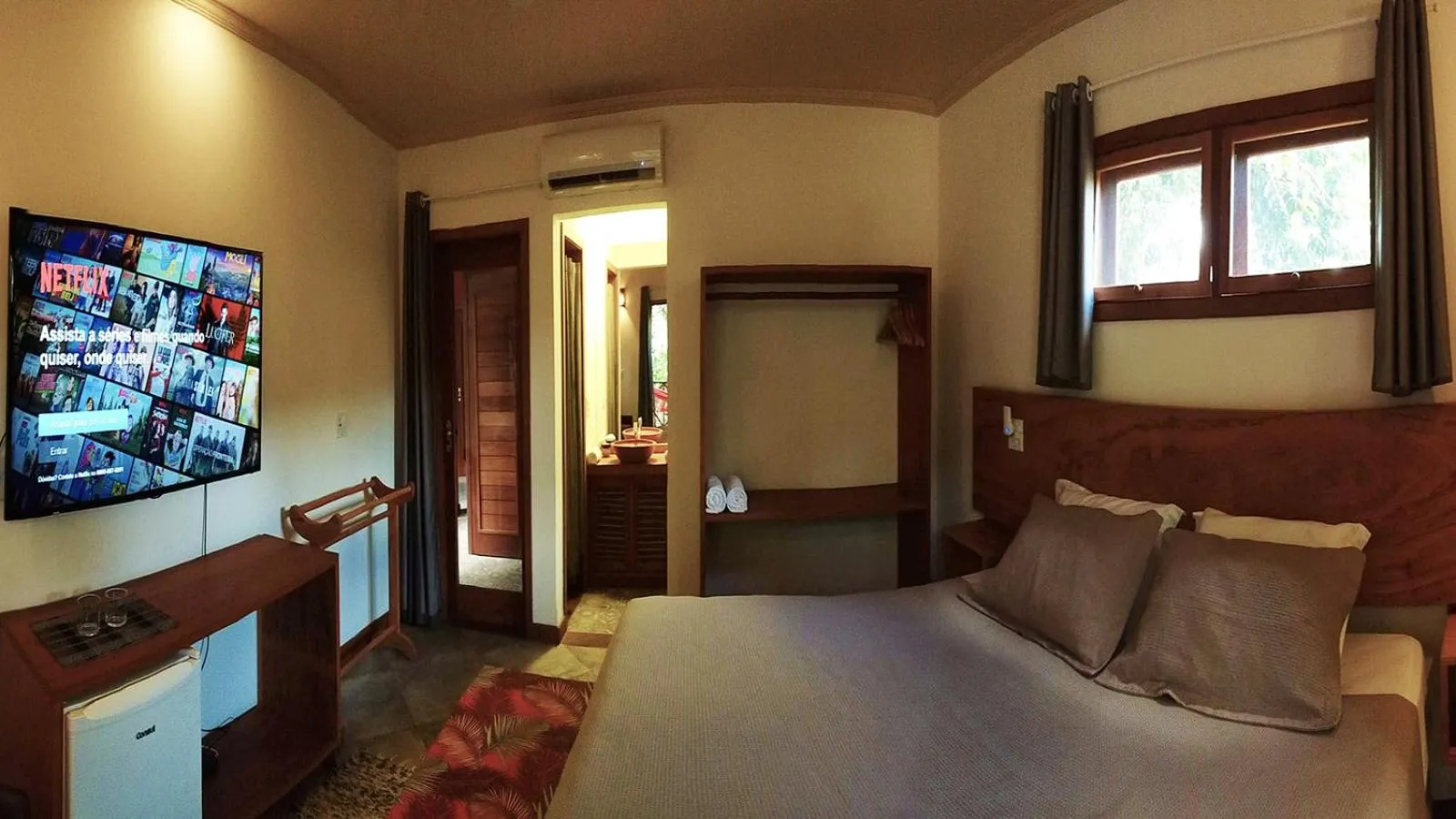 Photo of the whole room, Bed in Pousada Vila Araticum