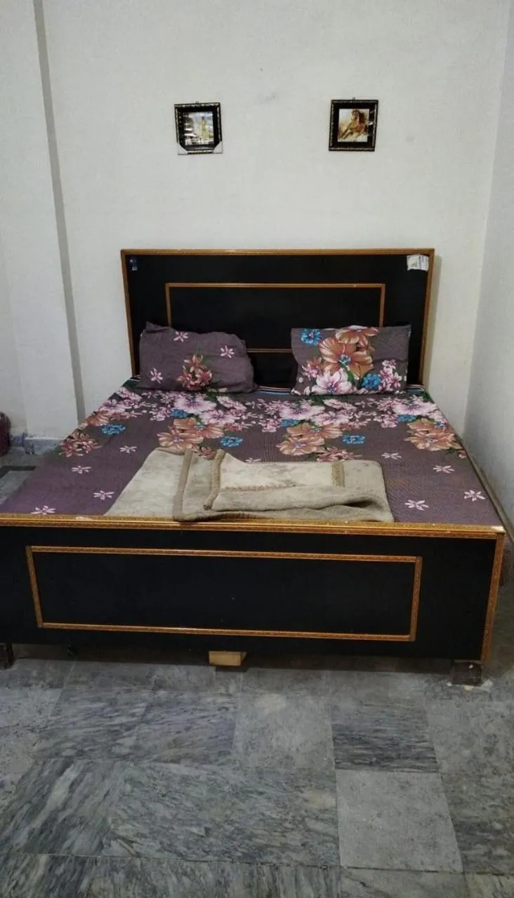 Bed in New Taj Hotel