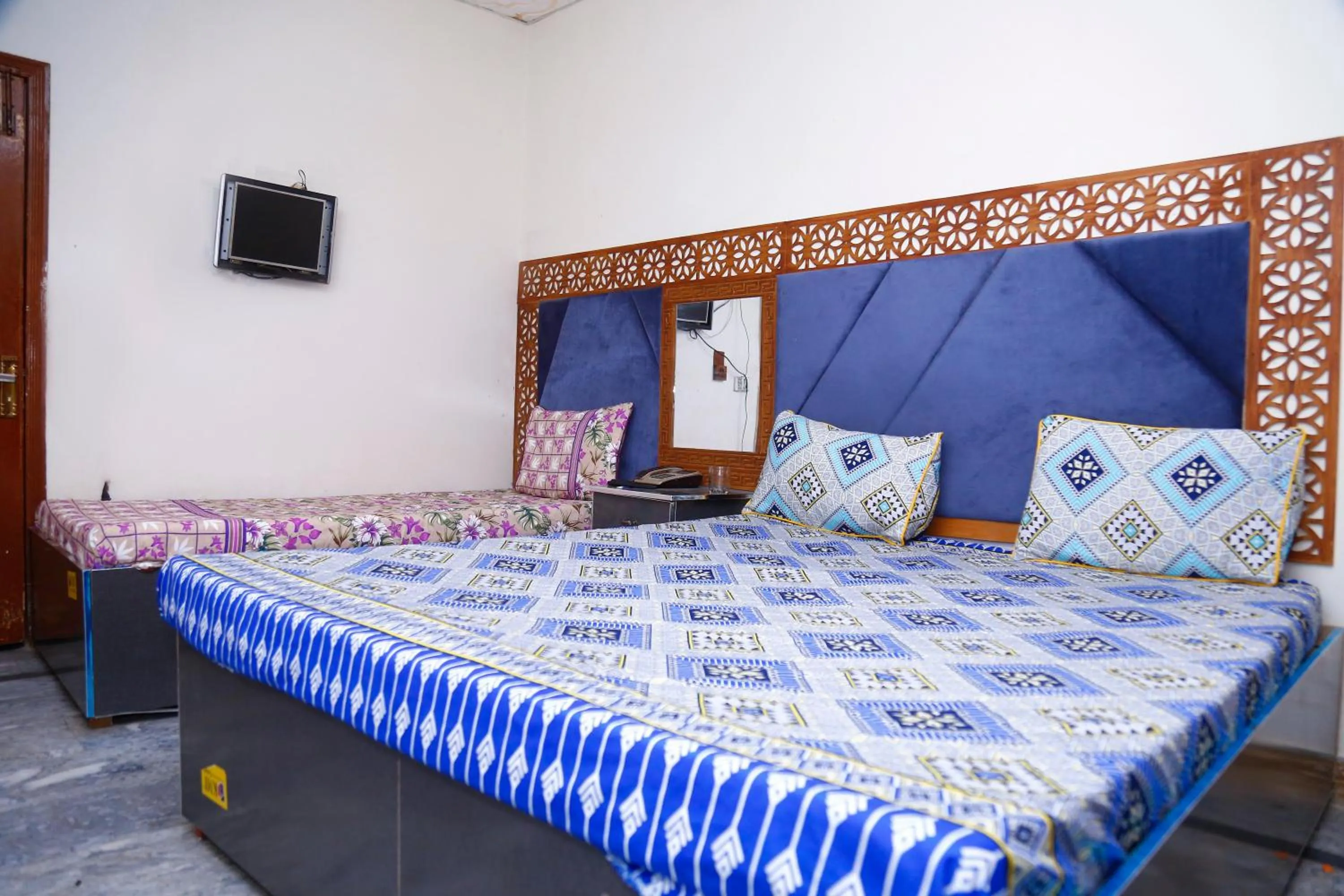 Bed in New Taj Hotel