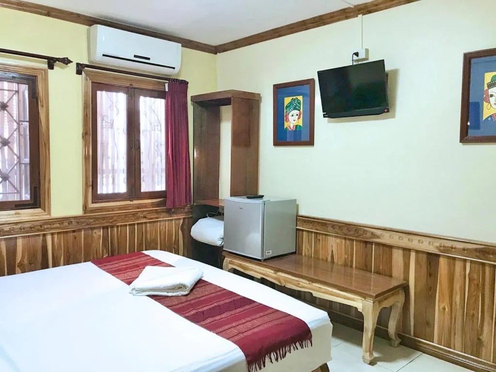 Communal lounge/ TV room, Bed in Apple Guesthouse