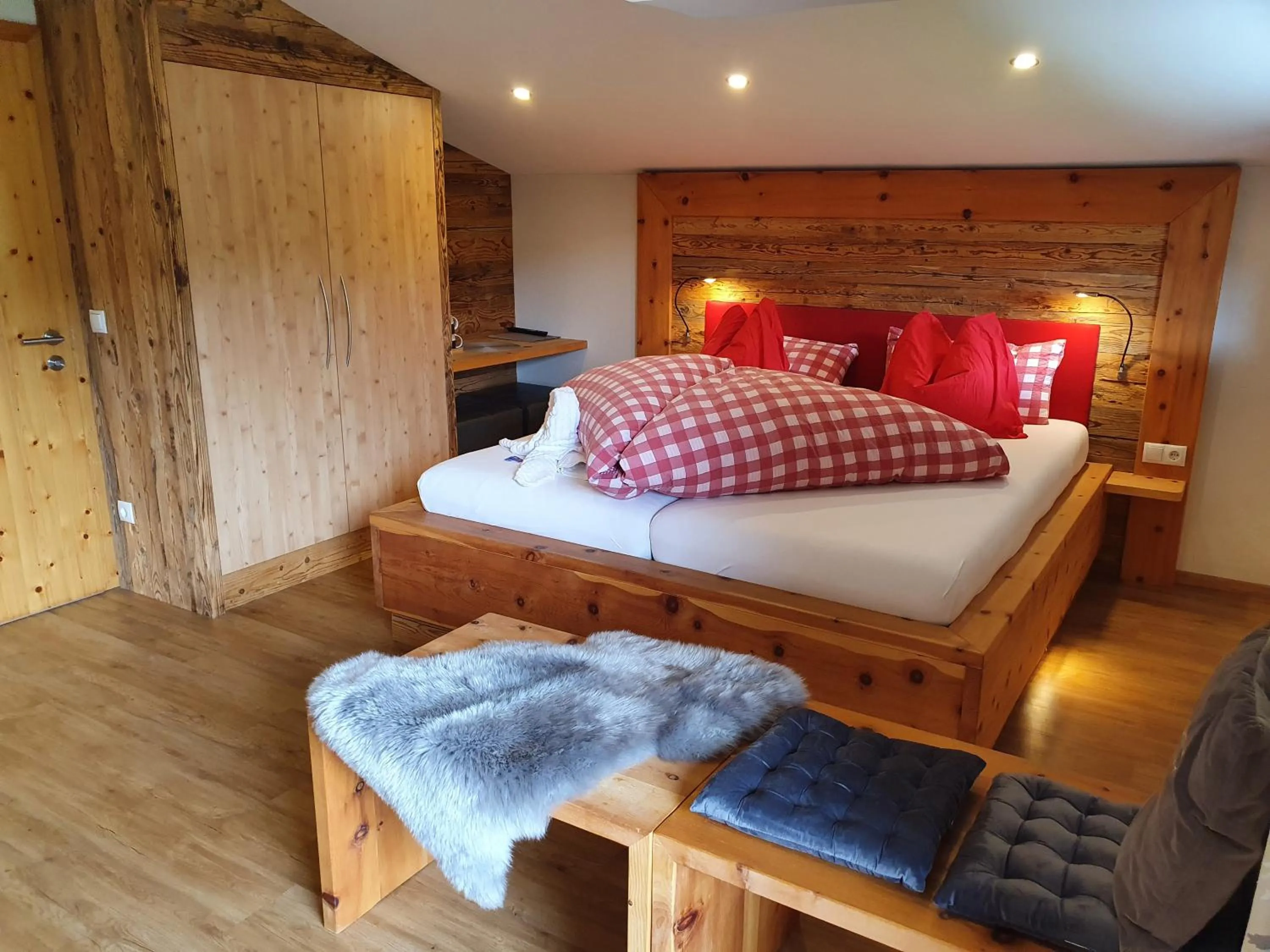 Photo of the whole room, Bed in Boutique Hotel Alpenhof