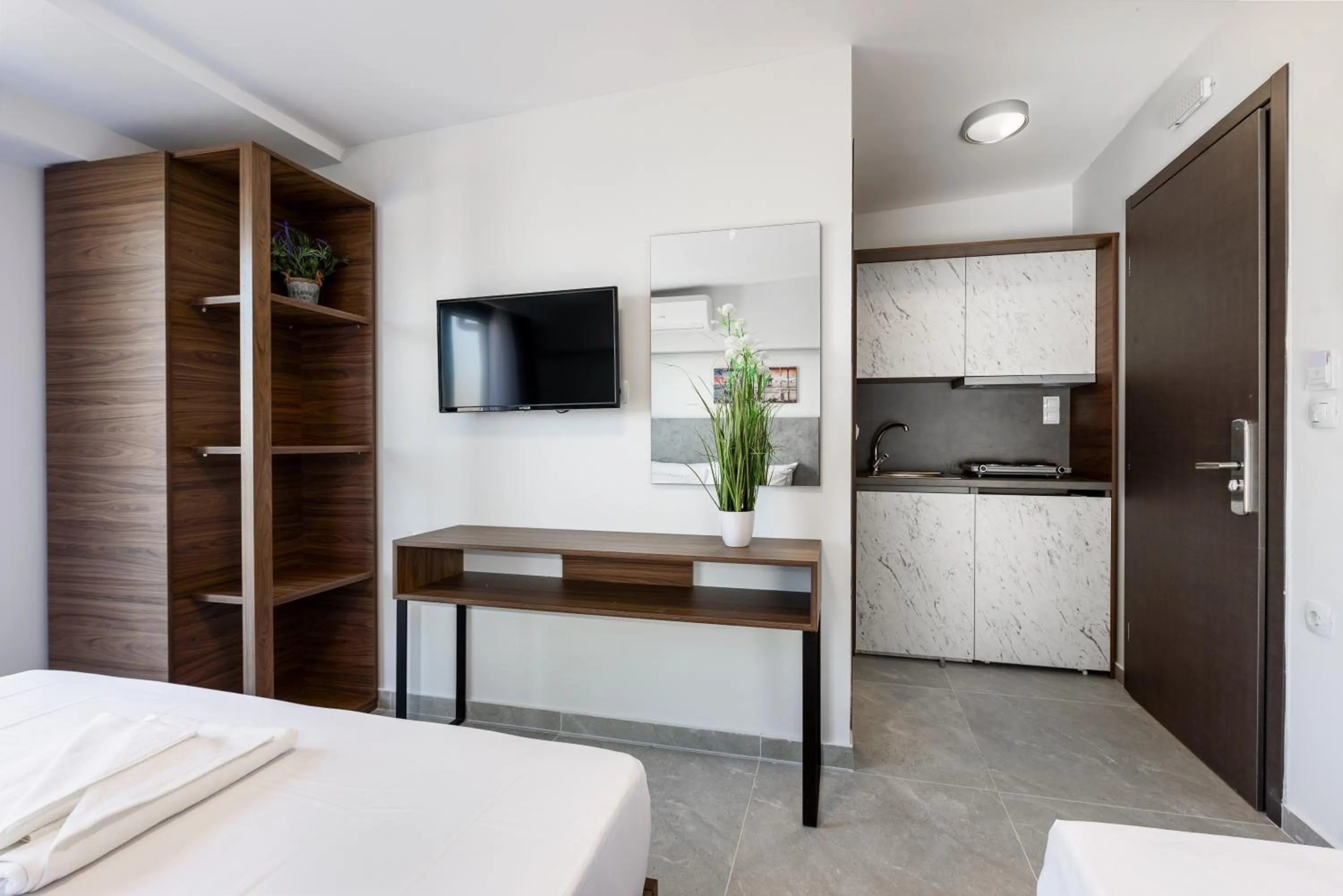 Photo of the whole room, Bed in ASTERAS STUDIOS