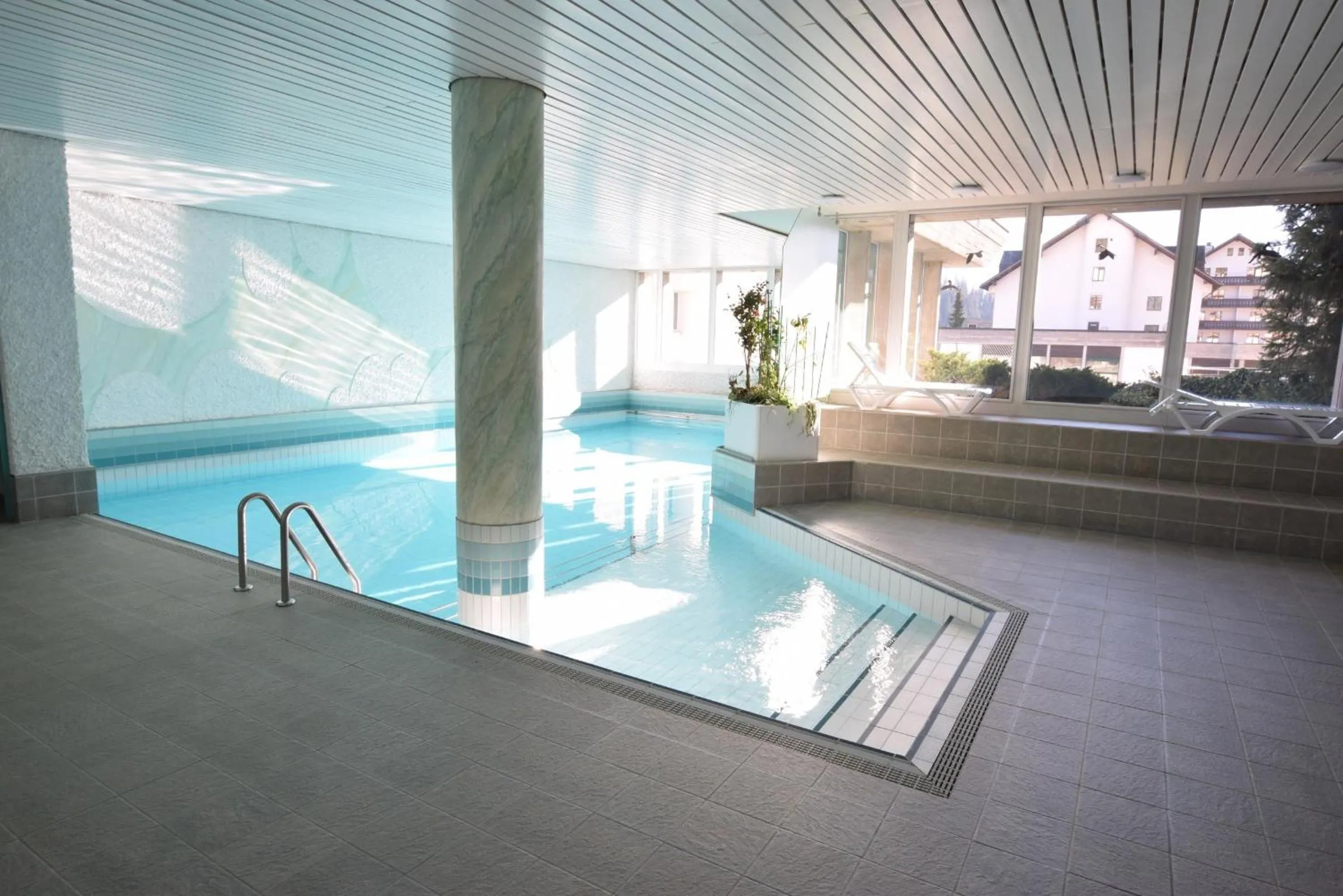 Swimming pool in LAAX Homes Casa Curnera 8