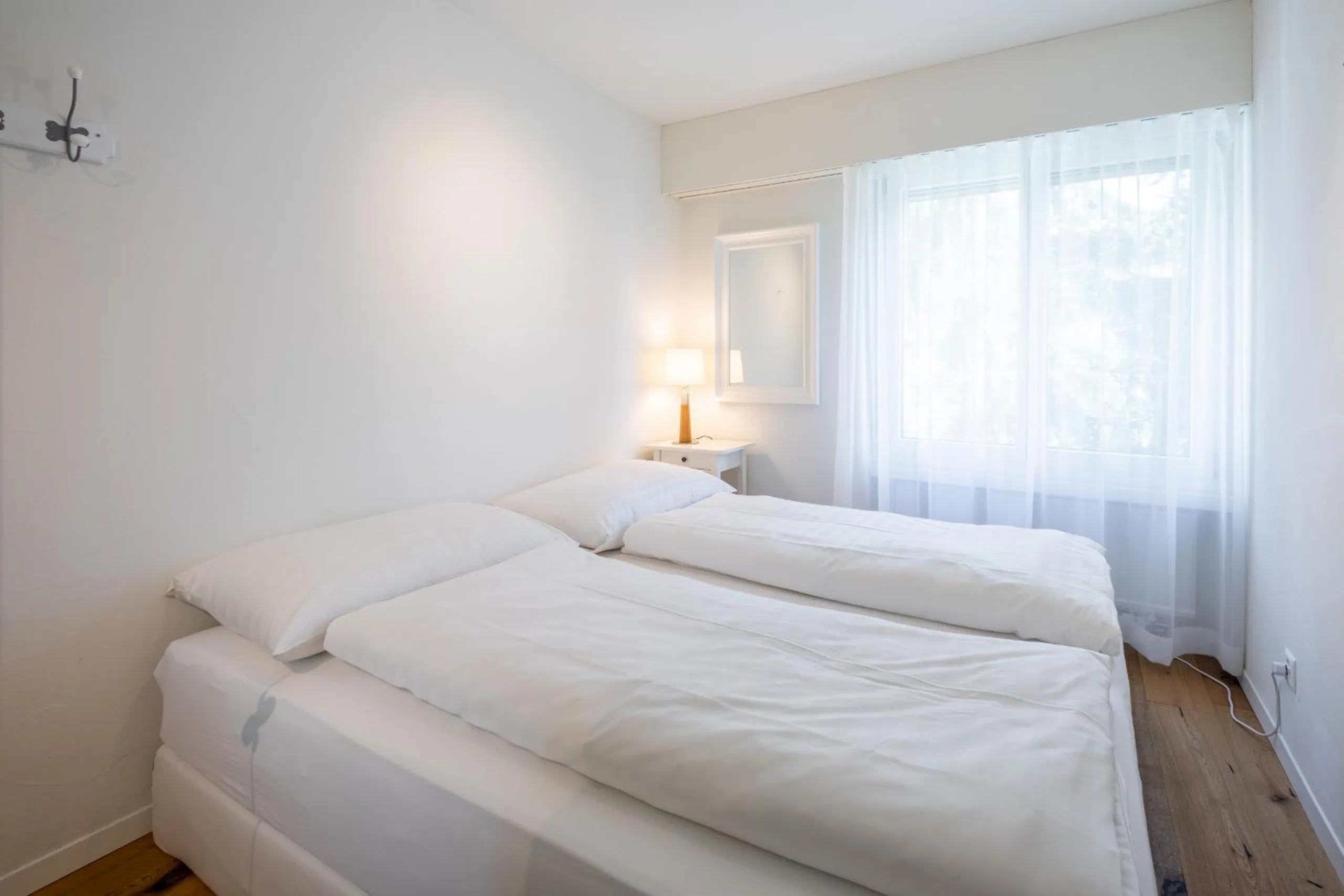 Bed in LAAX Homes Casa Curnera 8