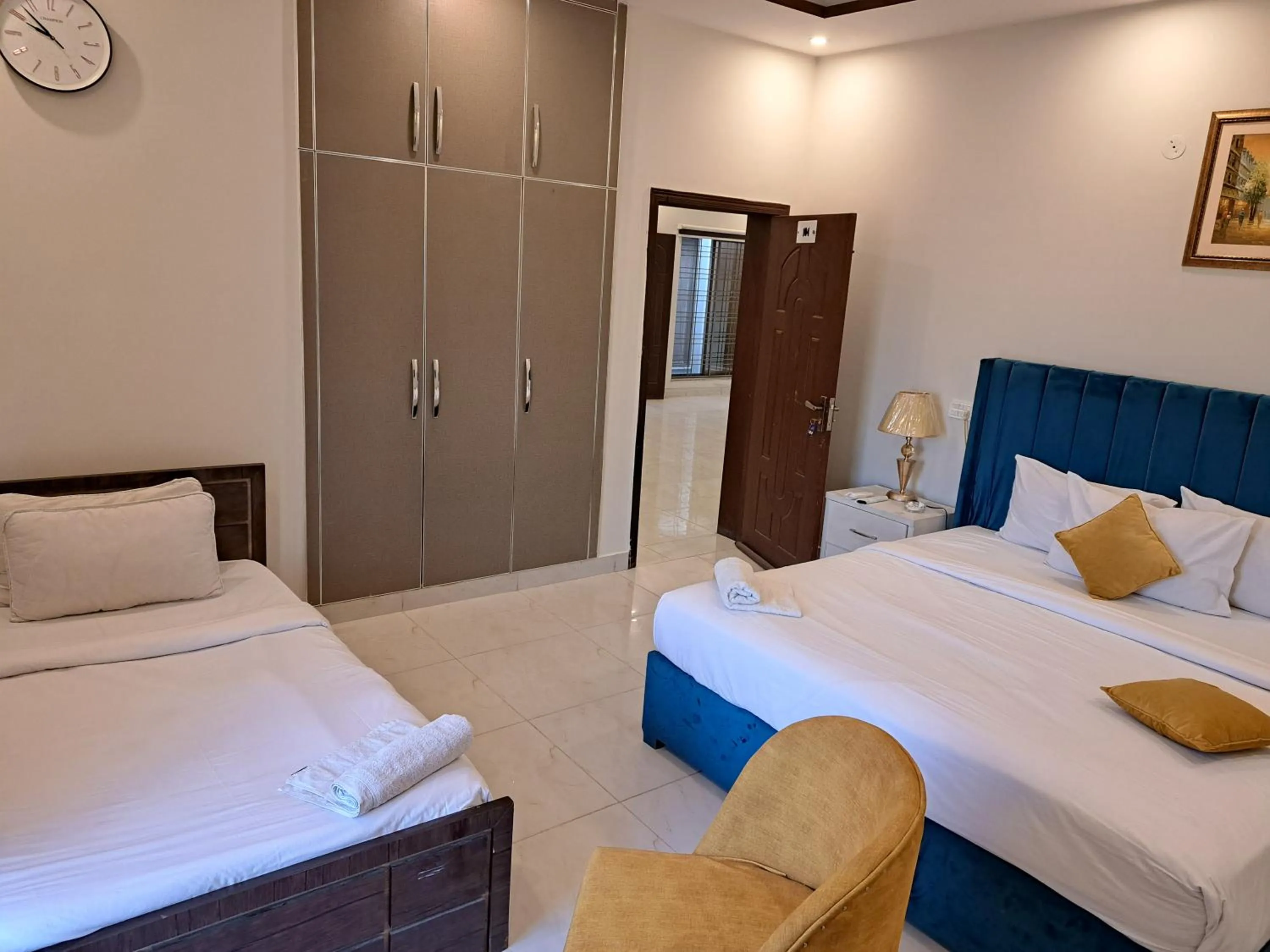 Bed in Cuzzy Inn Hotel