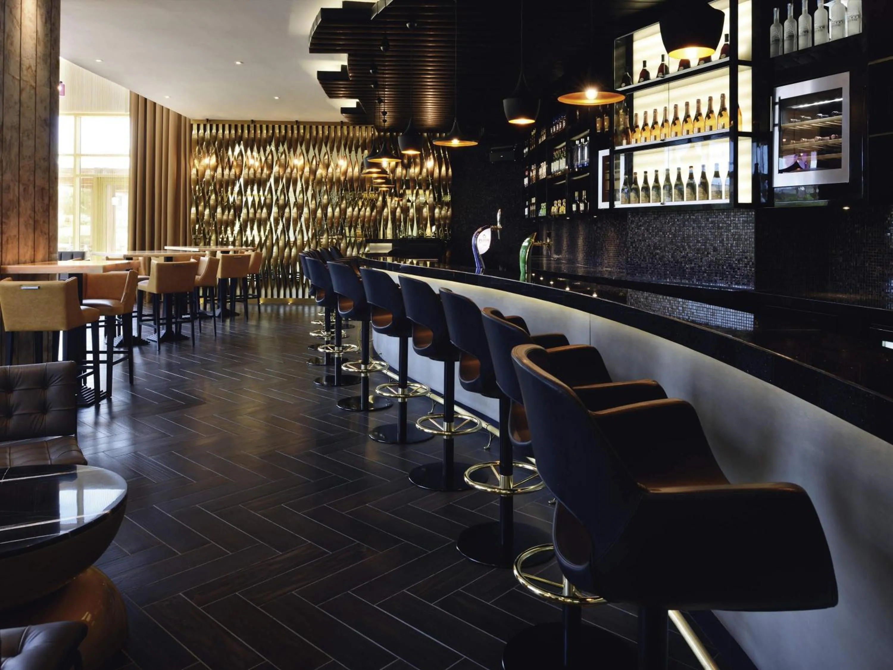 Lounge or bar in Mövenpick Ambassador Hotel Accra