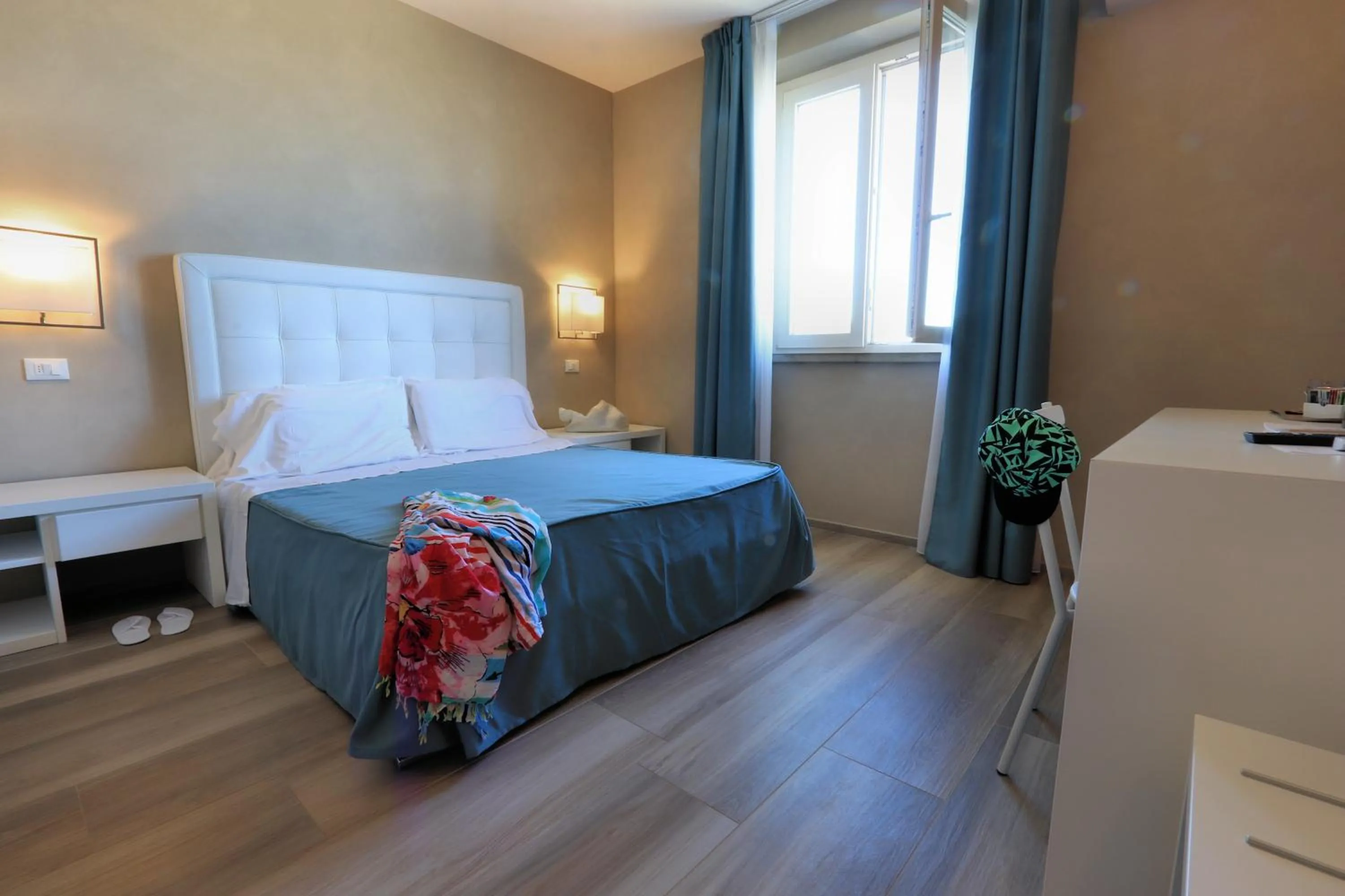 Bed in Hotel Cecina Beach