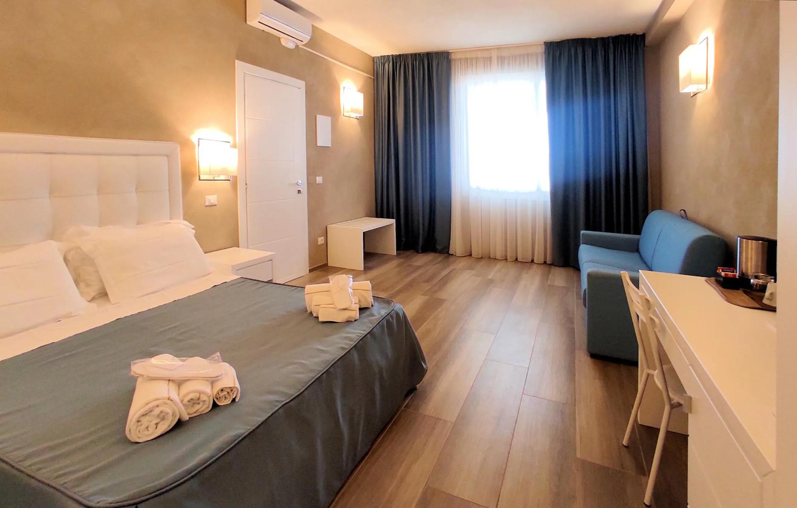 Bed in Hotel Cecina Beach