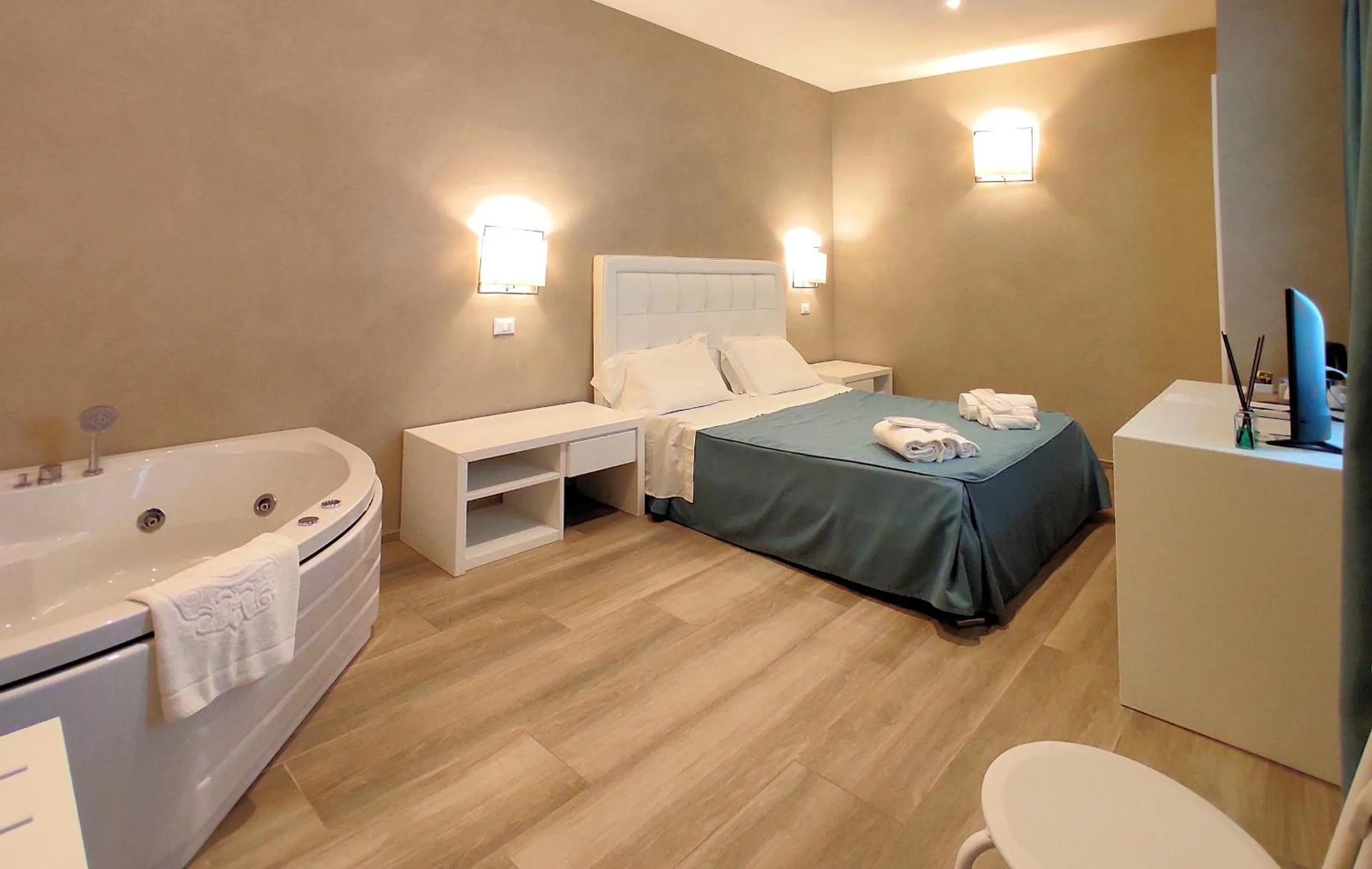 Bed in Hotel Cecina Beach