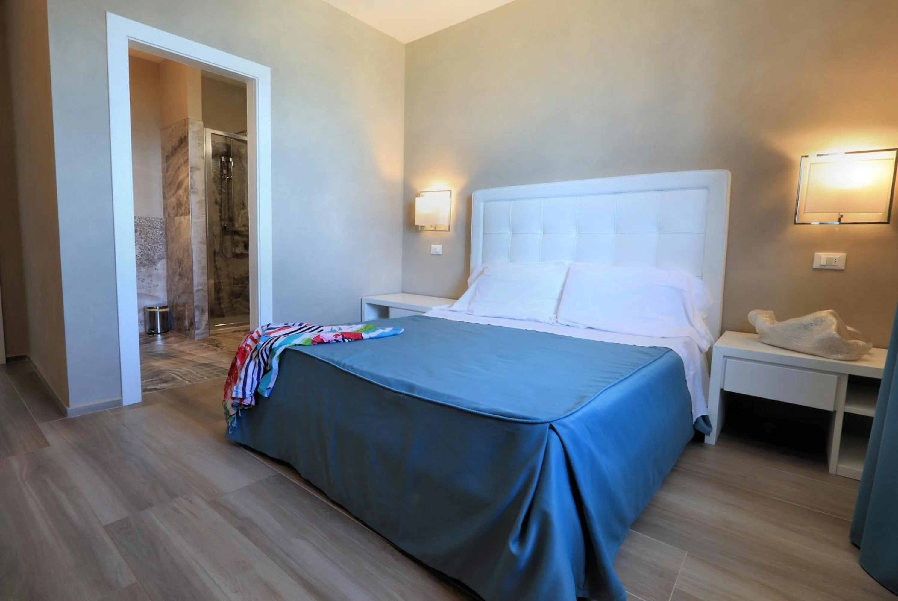 Bed in Hotel Cecina Beach