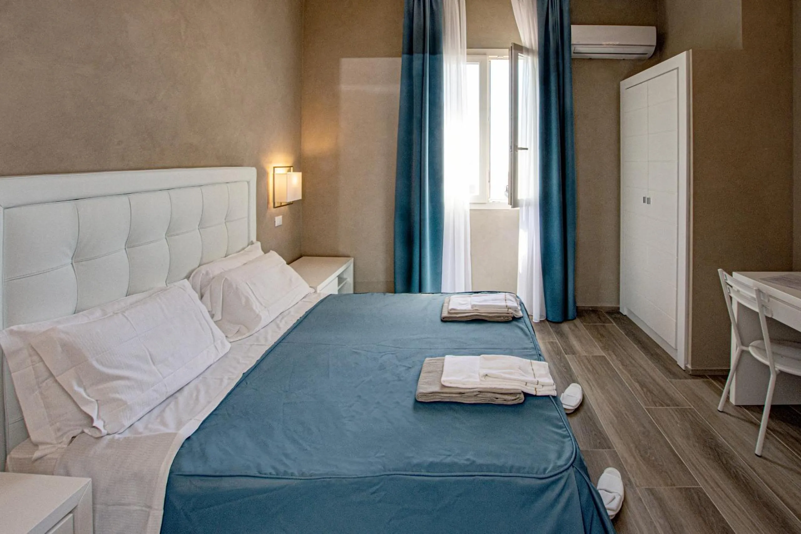 Bed in Hotel Cecina Beach
